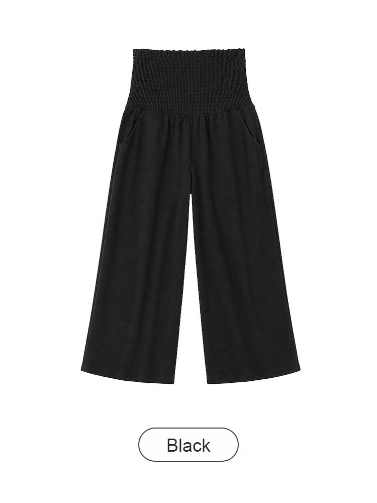 Black wide-leg maternity pants front view with high smocked belly panel VEIMIA