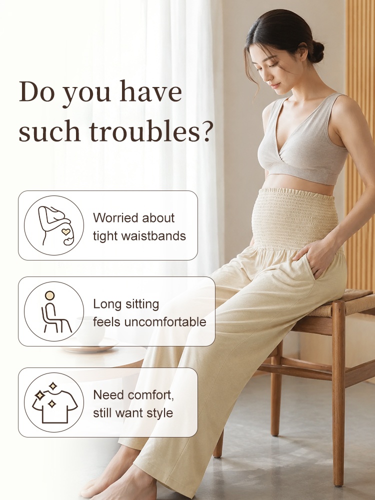 Pregnant model seated in beige maternity pants with comfort concern feature graphic VEIMIA
