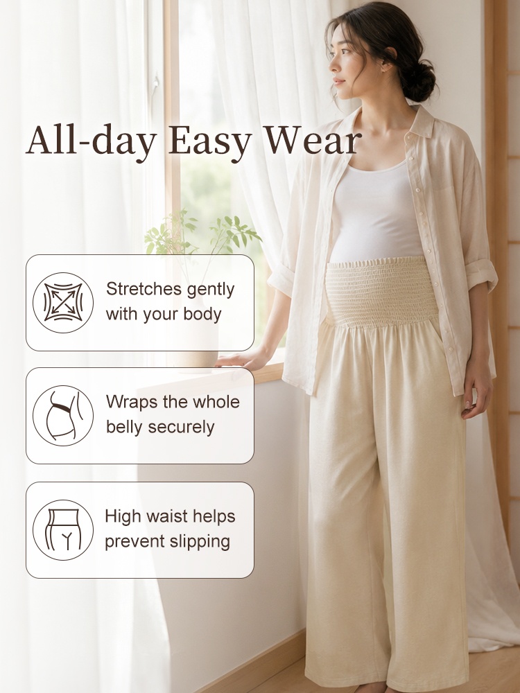 Model wearing beige wide-leg maternity pants with full belly coverage and high waist VEIMIA