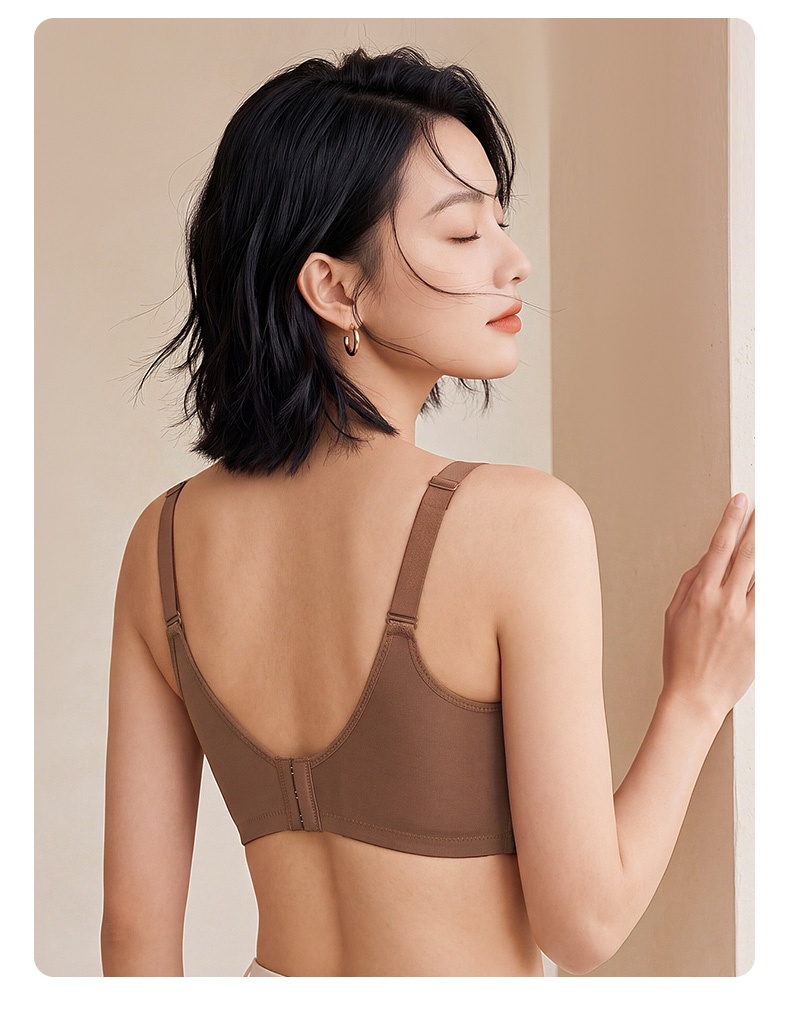 Back view of model wearing brown bra with adjustable straps and hook closure VEIMIA