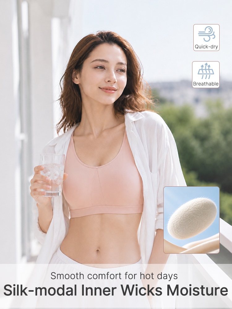 Model wearing pink wireless bra with moisture-wicking inner cup graphic VEIMIA