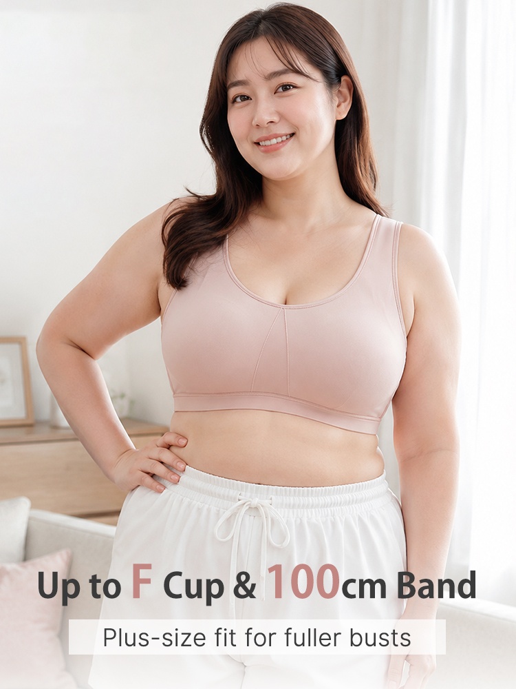 Model wearing pink full coverage bra with plus size fit graphic VEIMIA