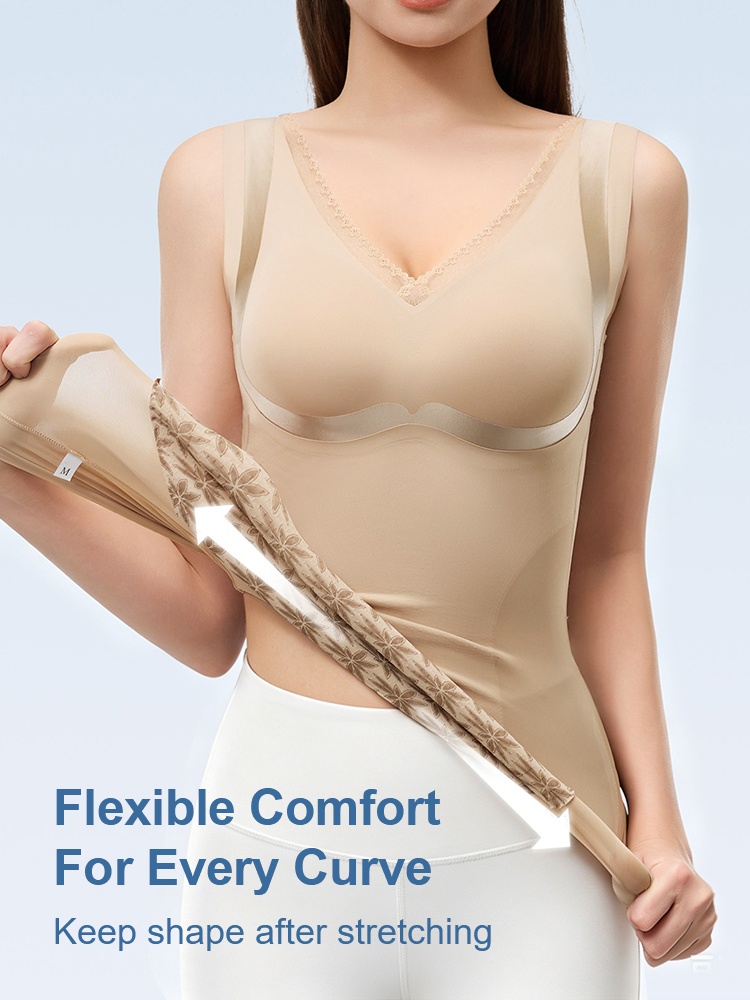 Model stretching sand shaping top to show flexible comfort fit VEIMIA