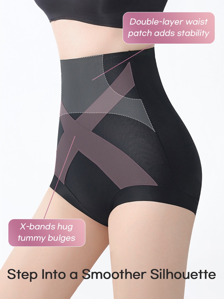 Side view of model wearing black high-waist shaping shorts with crossed tummy bands VEIMIA