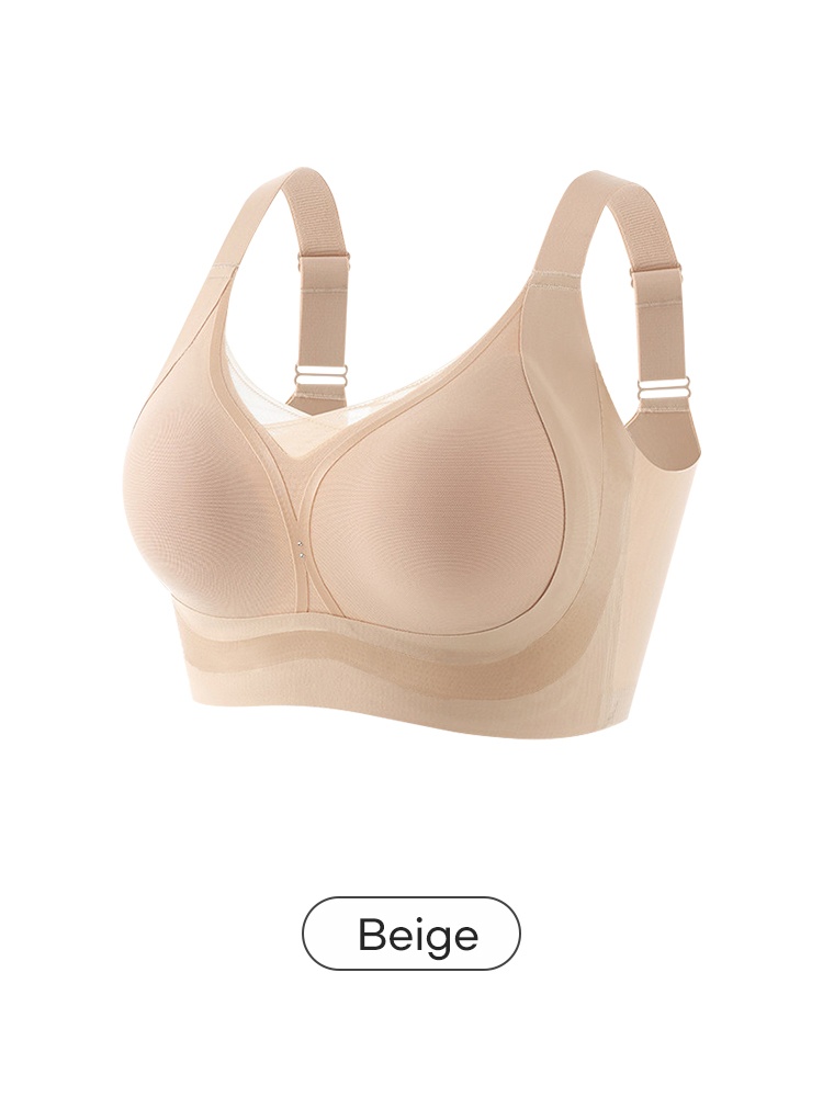Beige wireless bra front angled view with wide adjustable straps VEIMIA