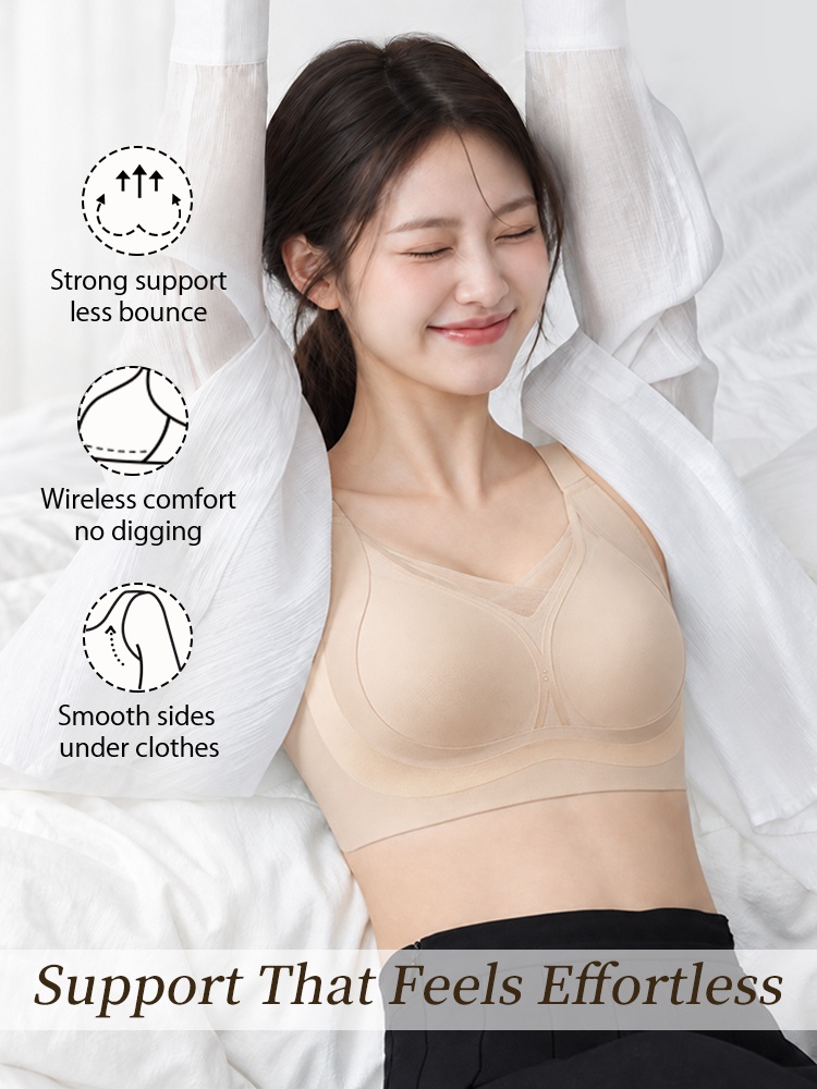 Model wearing beige wireless bra with support comfort and smooth side coverage VEIMIA