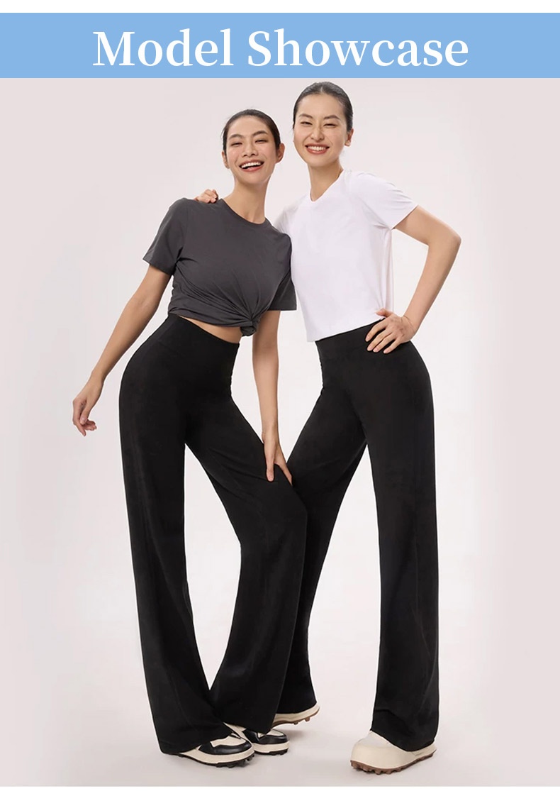 Model showcase of two models wearing black straight-cut pants VEIMIA