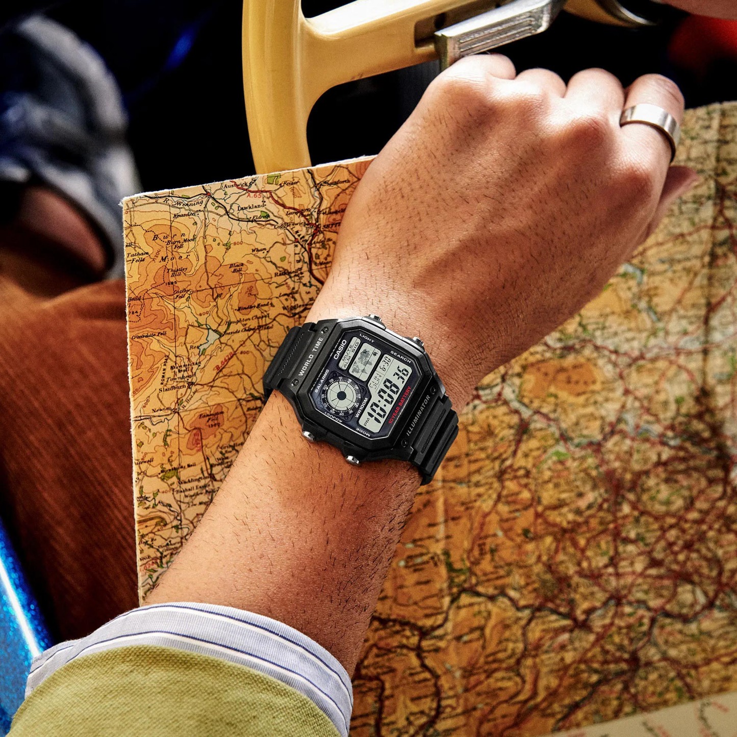 Casio Digital AE-1200WH-1AV World Map Alarm Youth Men's Watch (10-Years Battery Life) (Black) AE1200WH-1AV