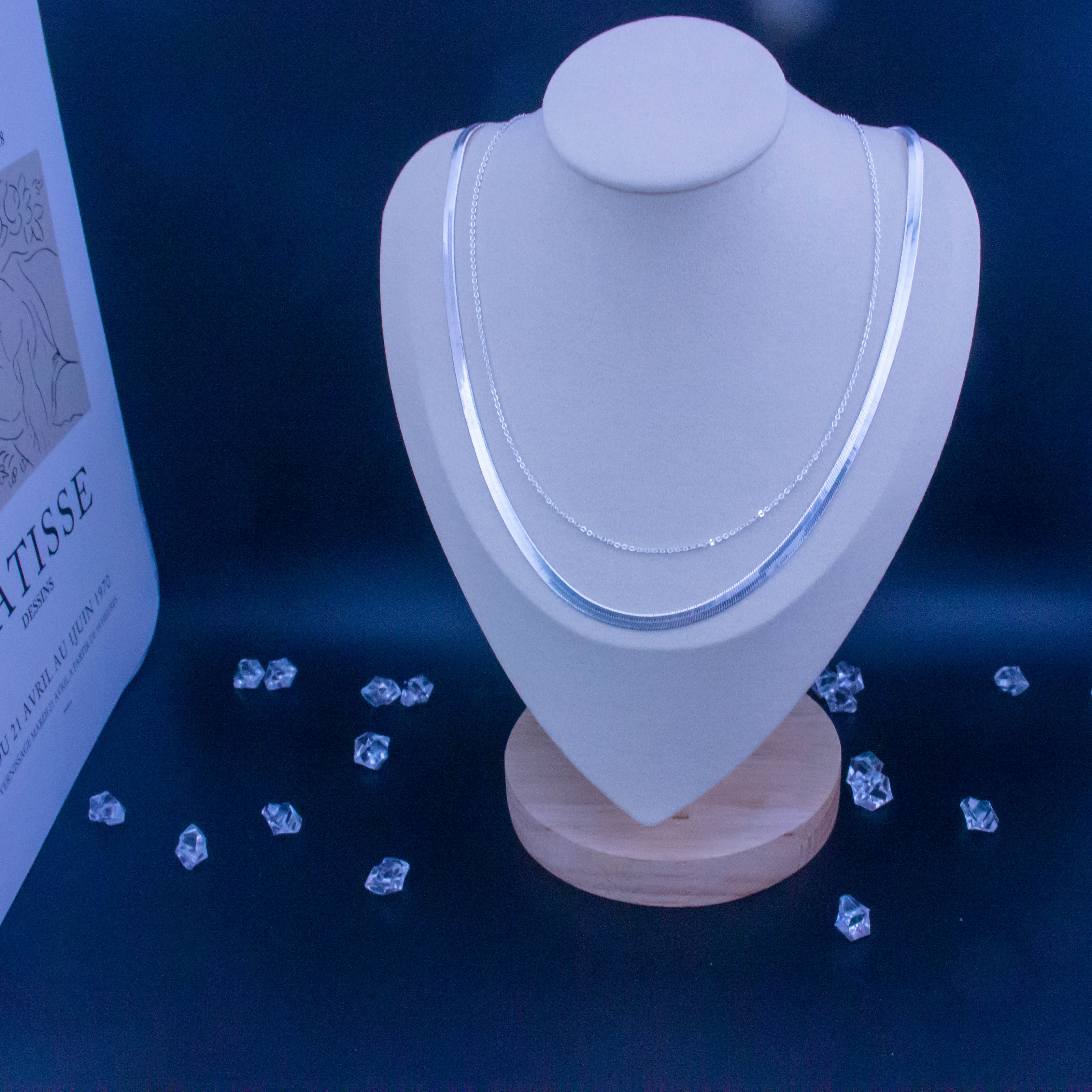 The silver chain can be worn single or folded/