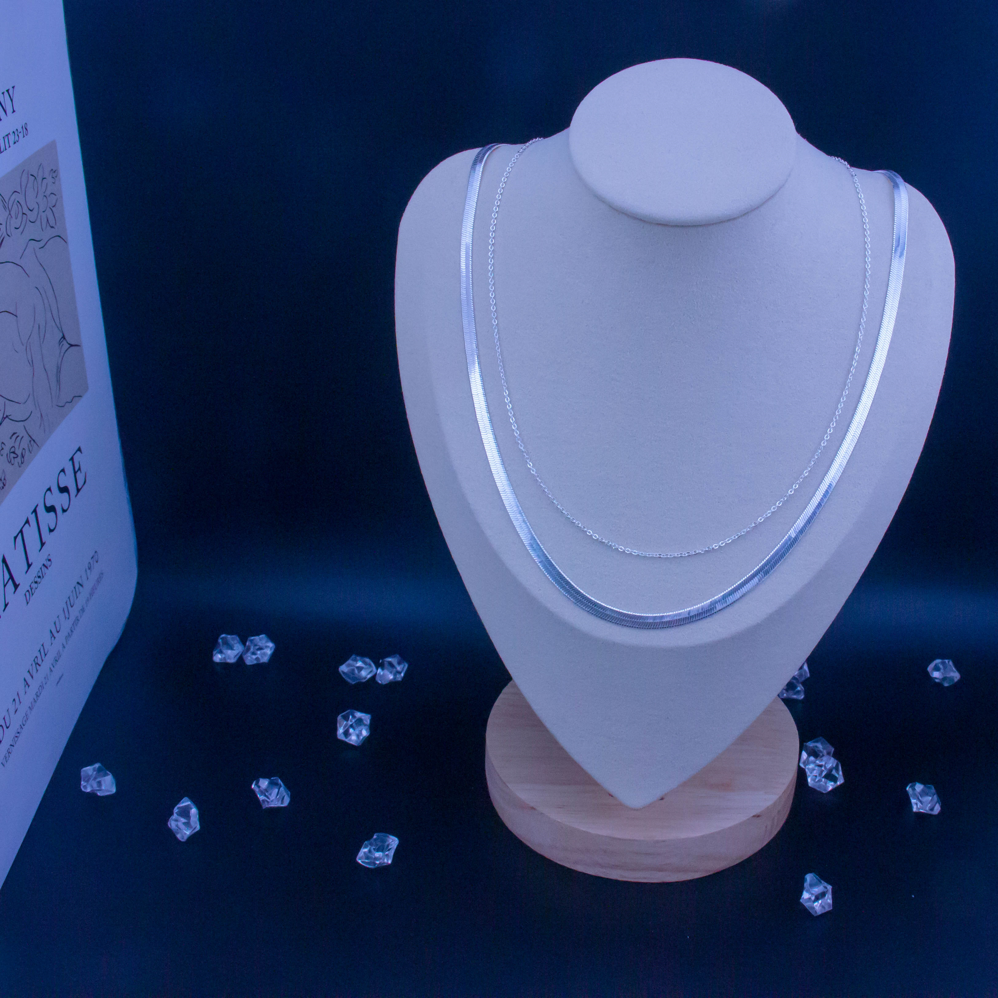 The silver chain can be worn single or folded/