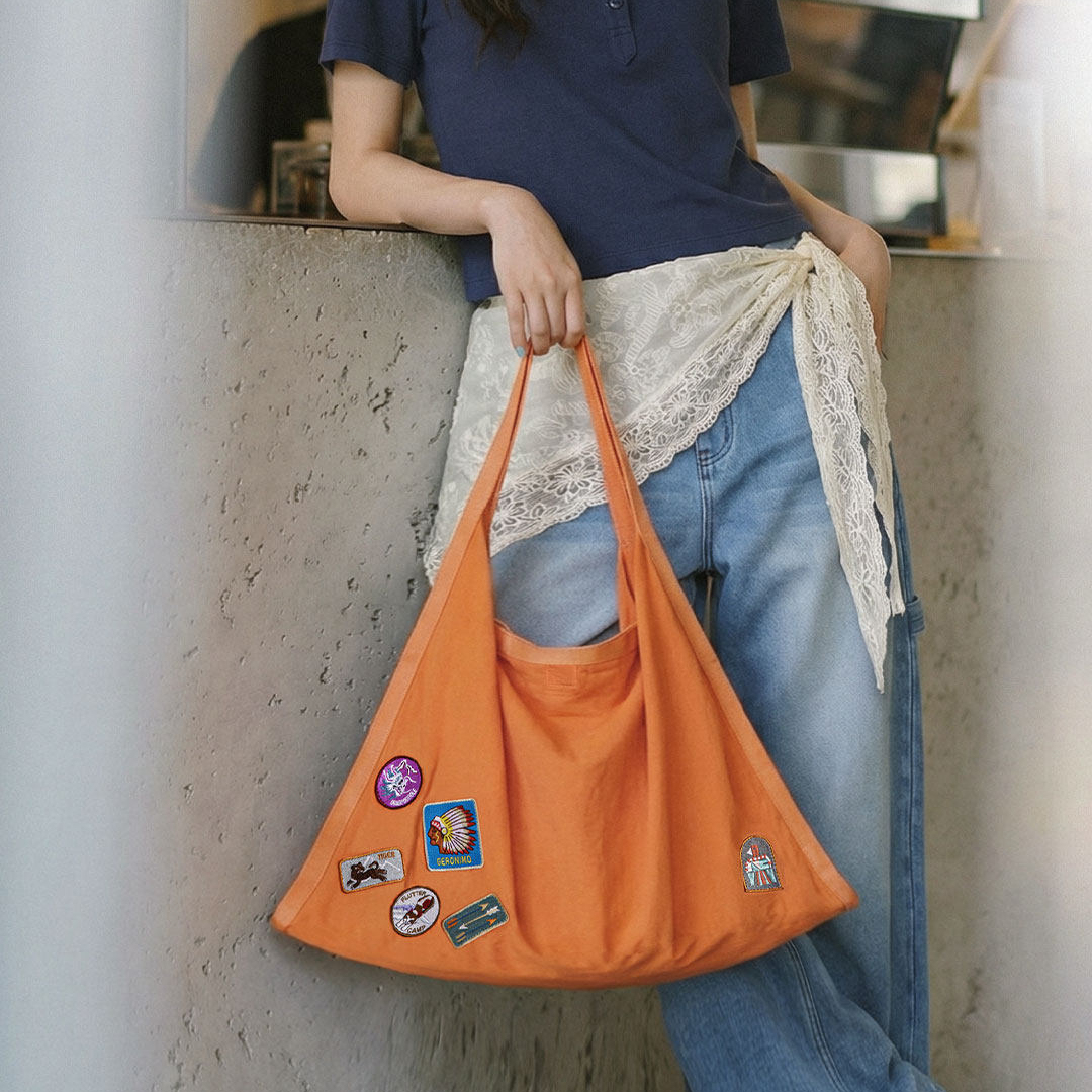 落日橘尼龍超大容量通勤電腦手提單肩出行輕托特包三角包女