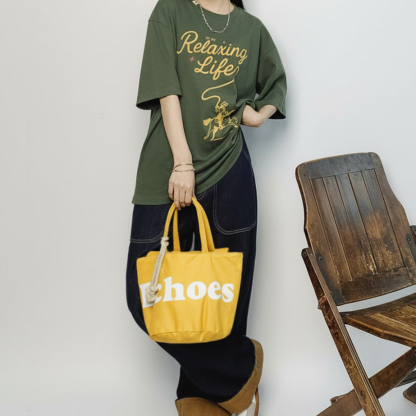 復古時尚手拎單肩黃色帆布水桶包斜挎包小個子單間手提包包女