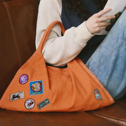 落日橘尼龍超大容量通勤電腦手提單肩出行輕托特包三角包女