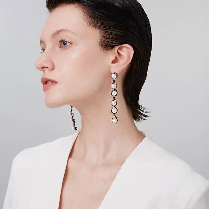 Curvilinear Collection Pearl Drop Earrings With Figure Of 8 Shape