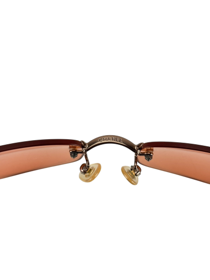 CHANEL - Orange Rectangular Tinted Rimless Sunglasses