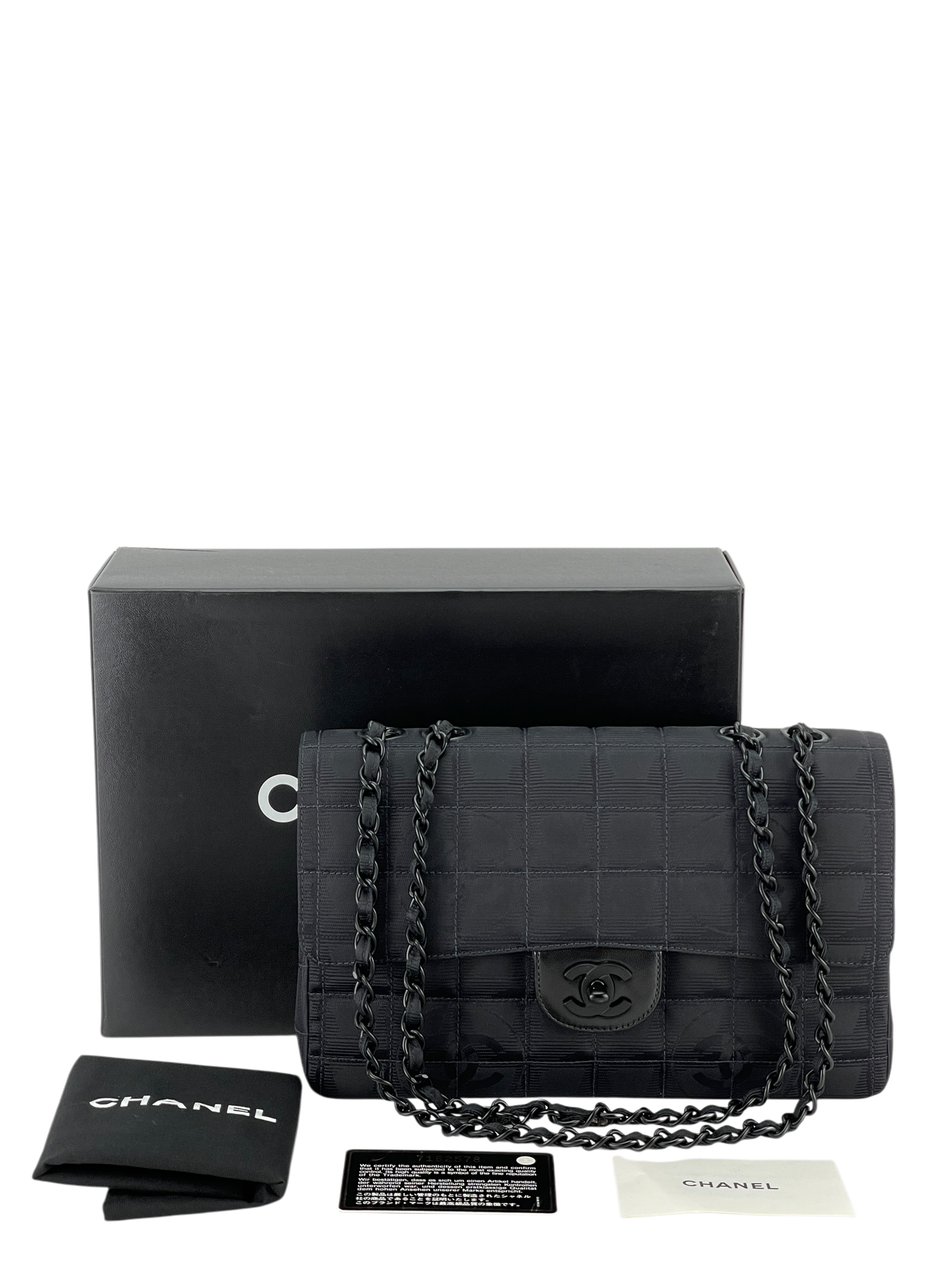CHANEL - Black Nylon Travel Line Medium Classic Flap Bag