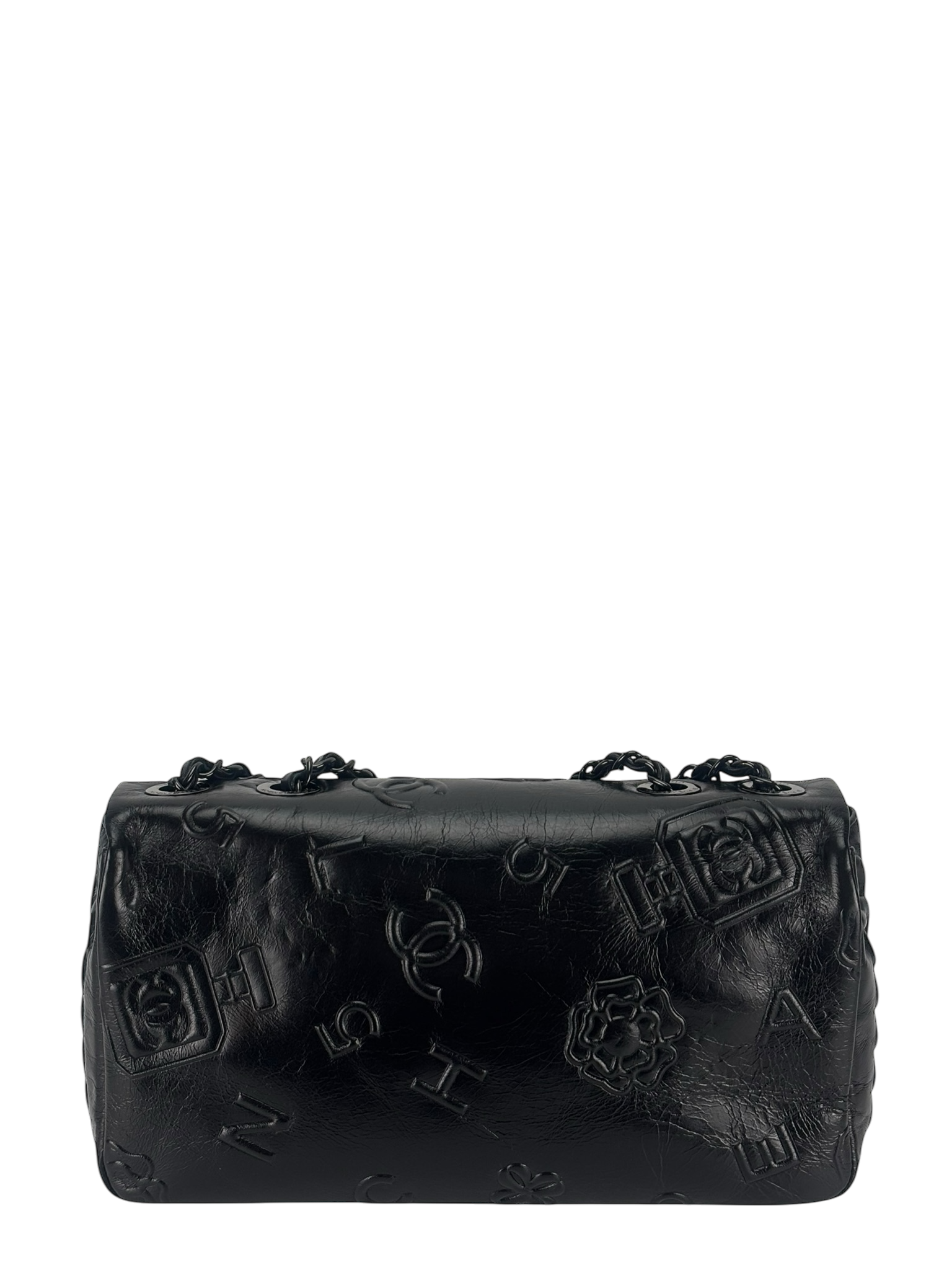 CHANEL - All Black Calfskin Precious Symbols Embossed Flap Bag