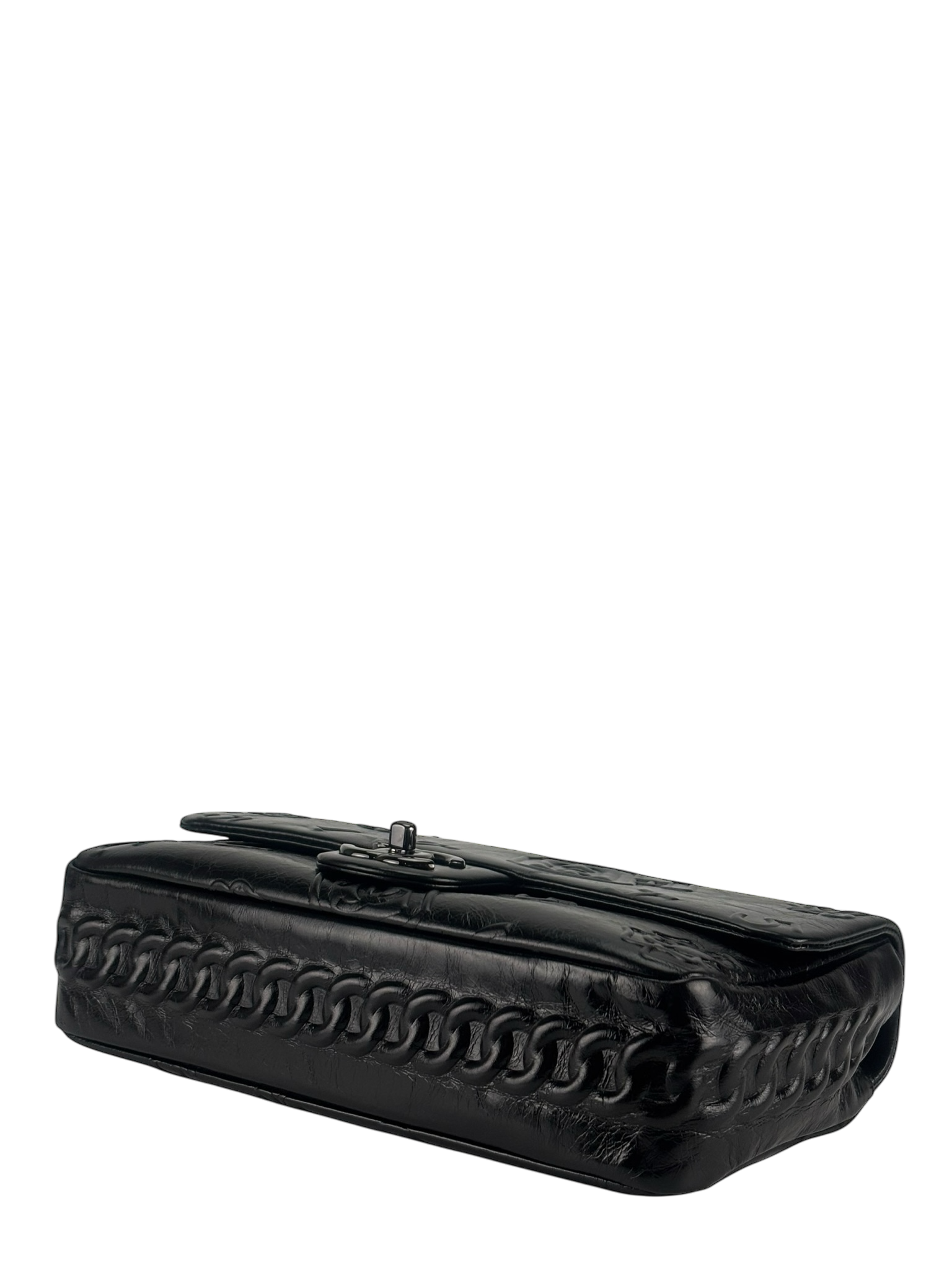 CHANEL - All Black Calfskin Precious Symbols Embossed Flap Bag