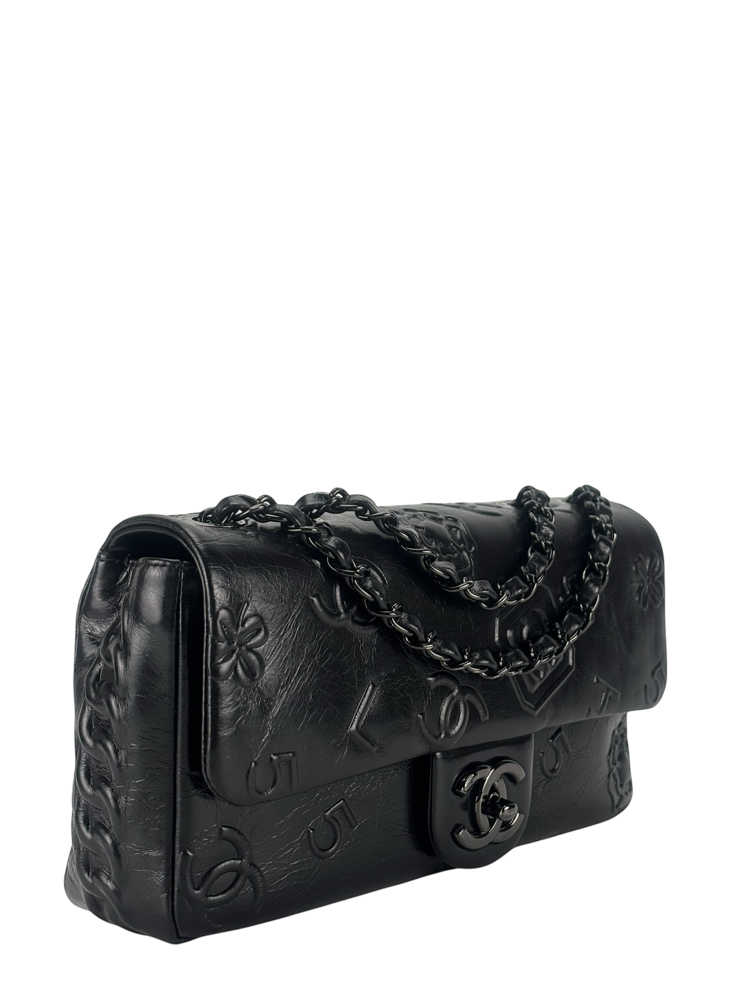 CHANEL - All Black Calfskin Precious Symbols Embossed Flap Bag