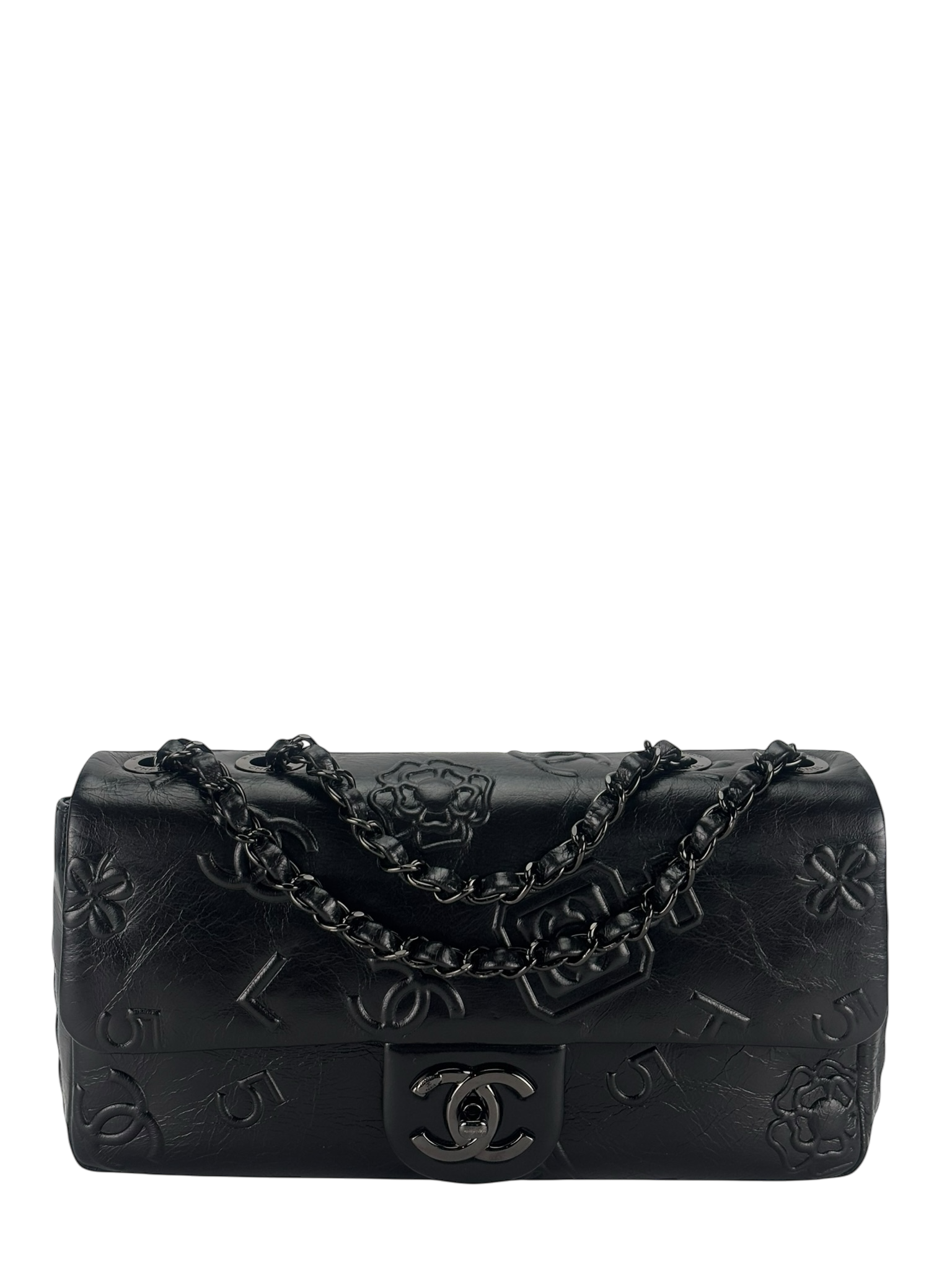 CHANEL - All Black Calfskin Precious Symbols Embossed Flap Bag