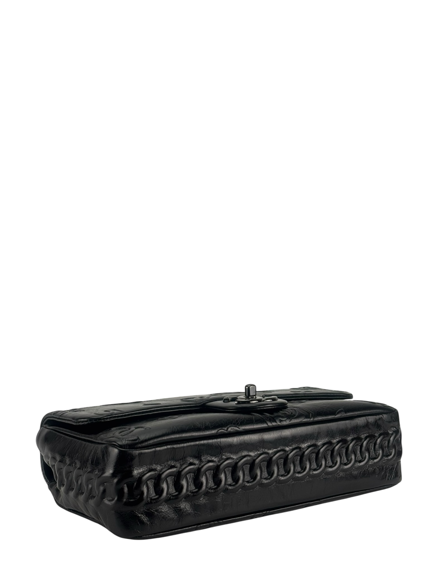 CHANEL - All Black Calfskin Precious Symbols Embossed Flap Bag