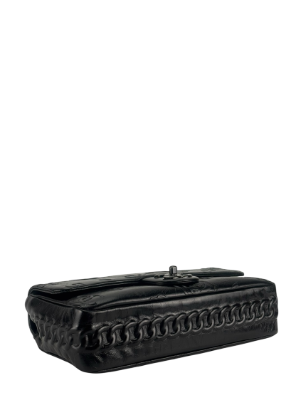 CHANEL - All Black Calfskin Precious Symbols Embossed Flap Bag
