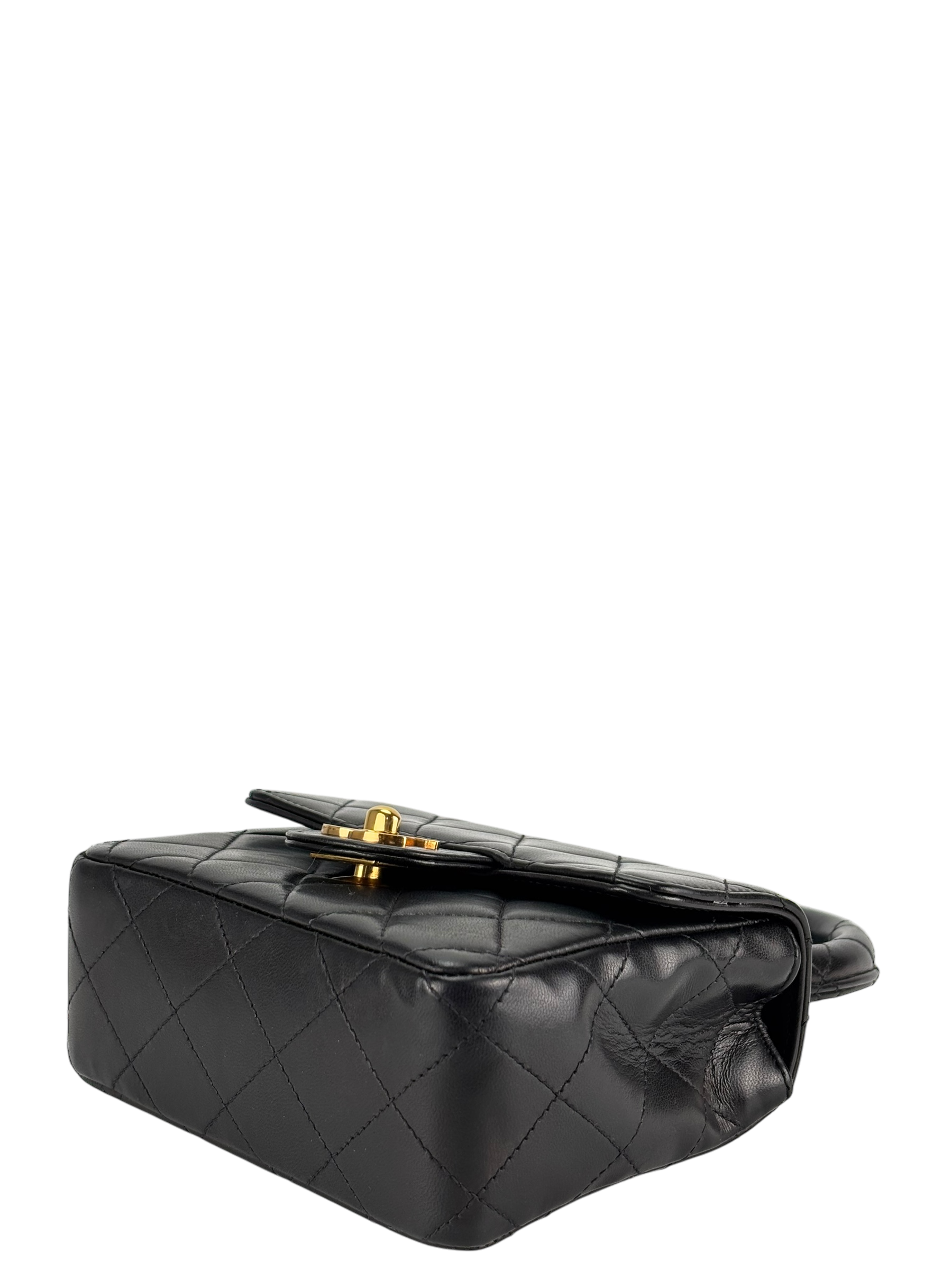 CHANEL - Black Lambskin Micro Classic Flap Handbag