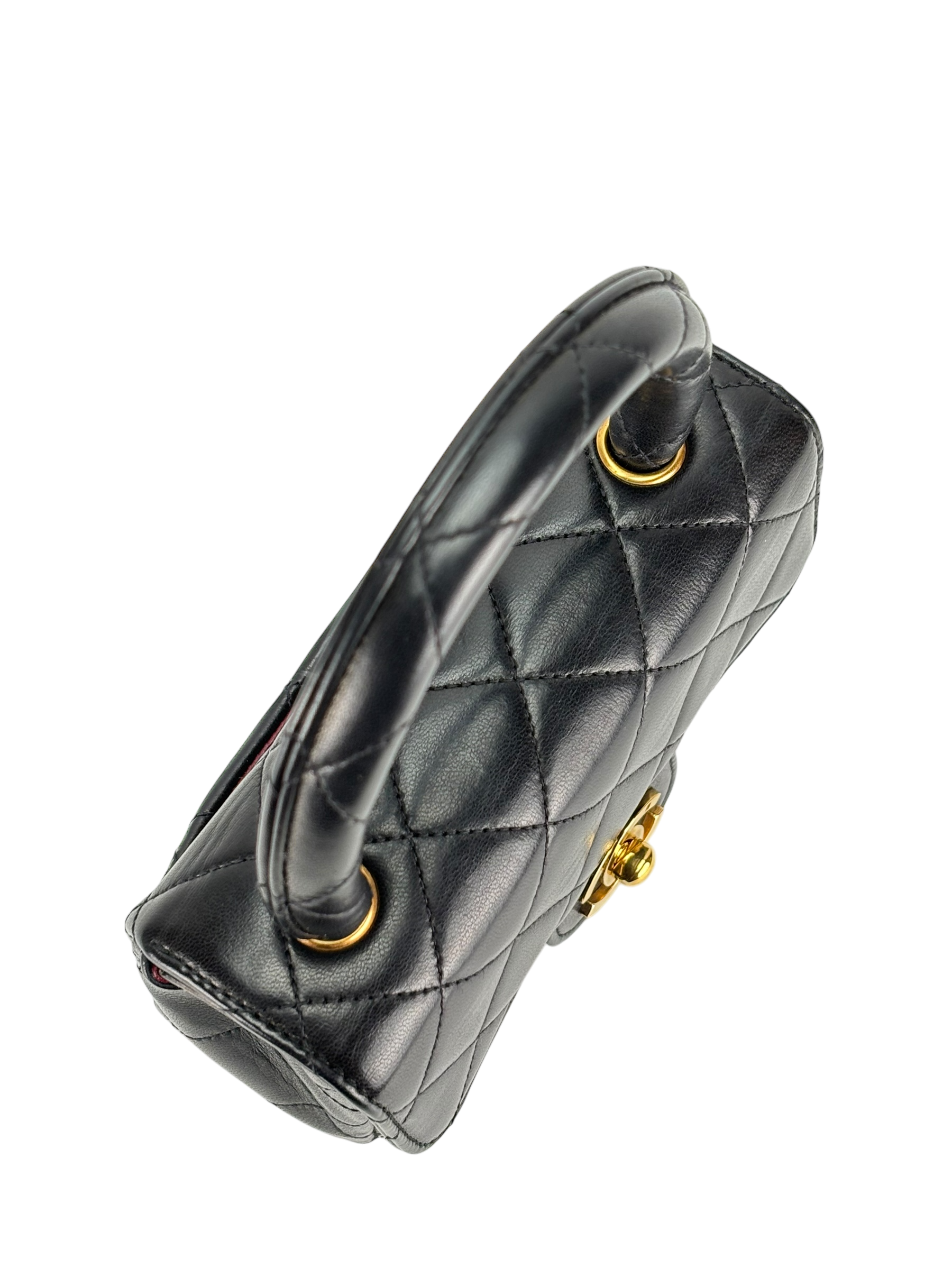 CHANEL - Black Lambskin Micro Classic Flap Handbag