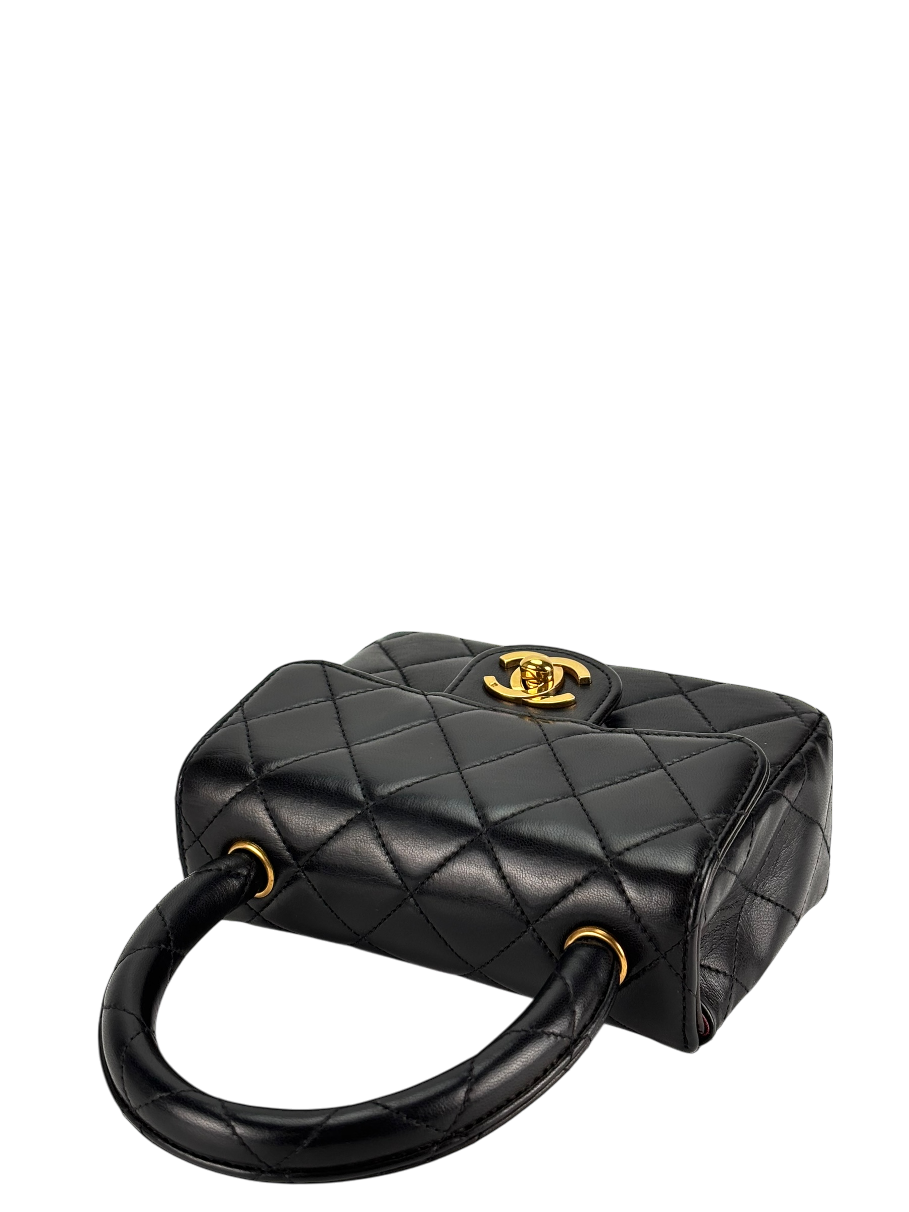 CHANEL - Black Lambskin Micro Classic Flap Handbag