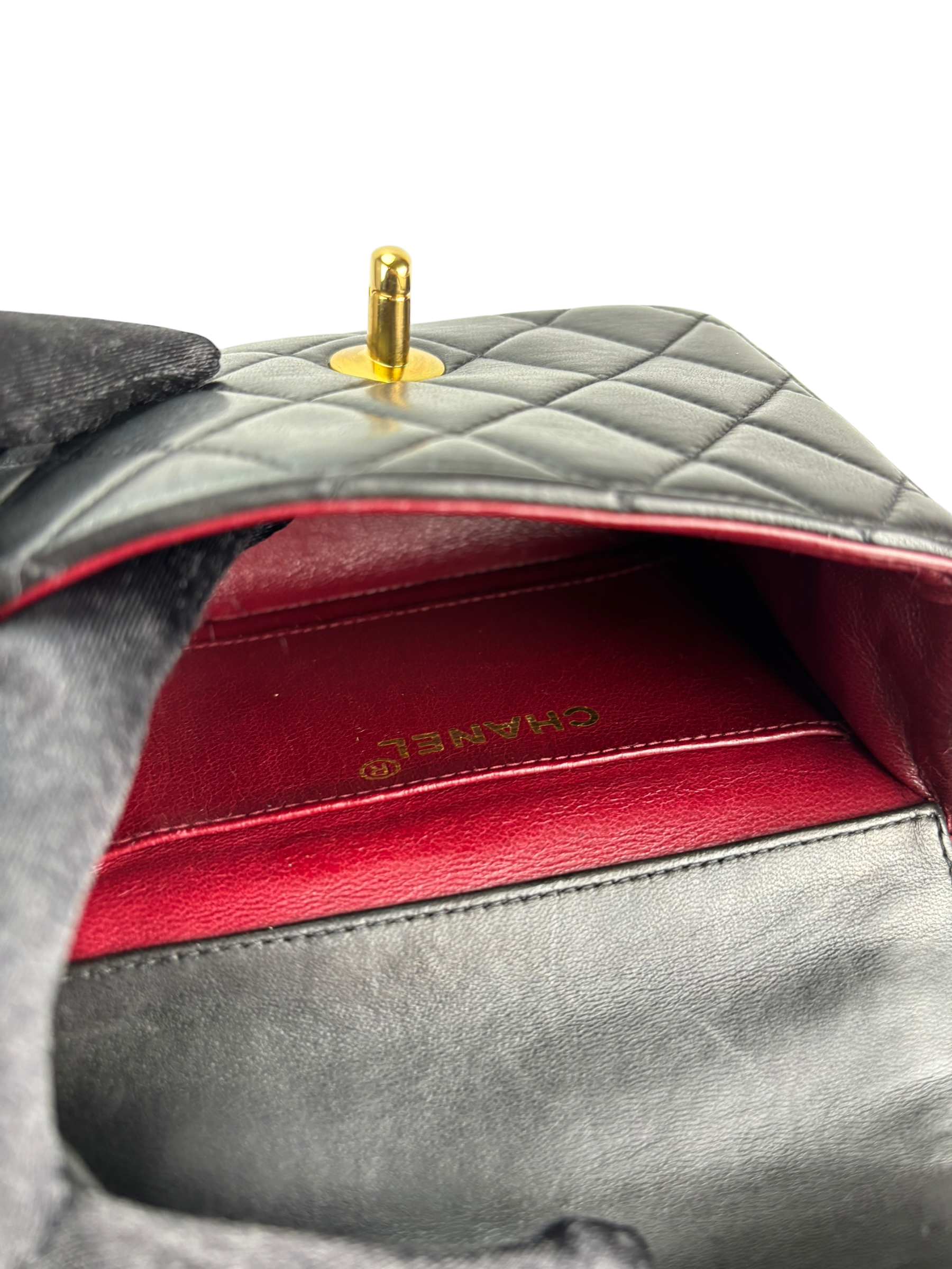 CHANEL - Black Lambskin Micro Classic Flap Handbag