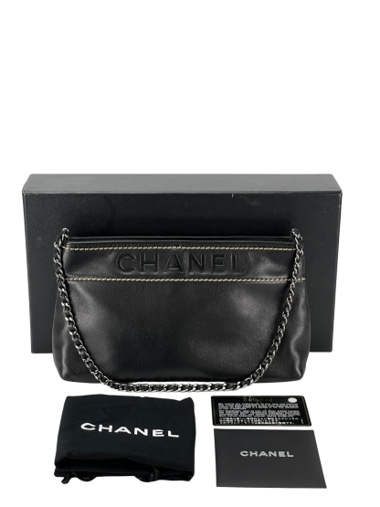 CHANEL - Black Lambskin Leather LAX Pochette Bag  
