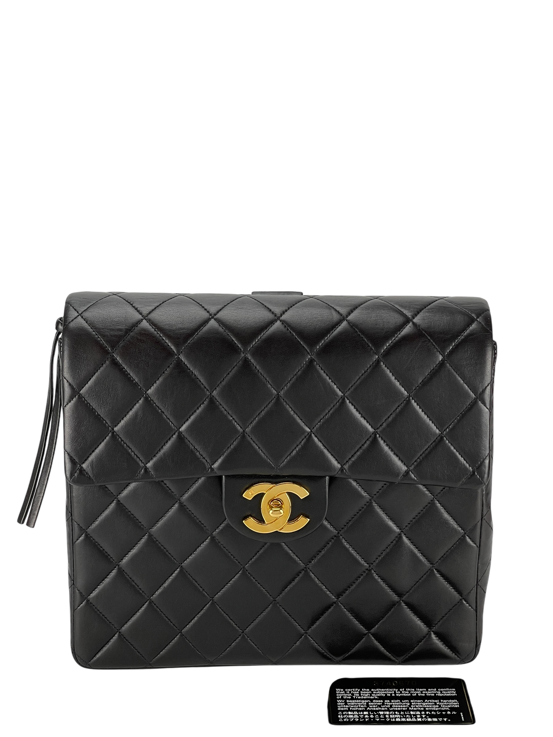 CHANEL - Black Lambskin Deca Coco Mark Matelasse Backpack