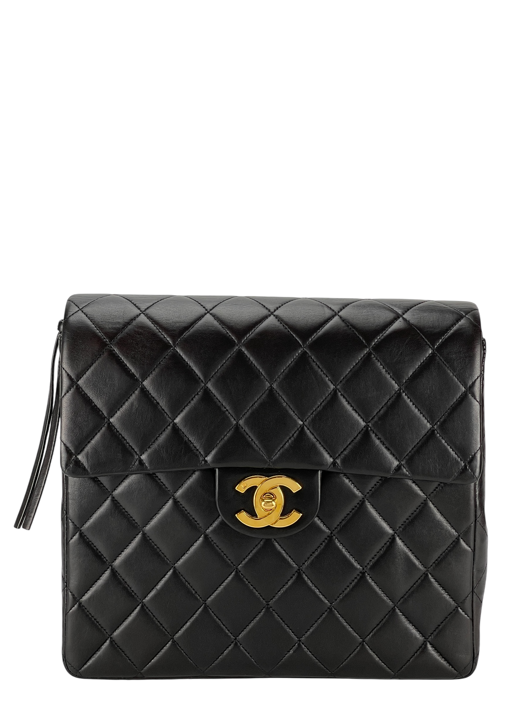 CHANEL - Black Lambskin Deca Coco Mark Matelasse Backpack