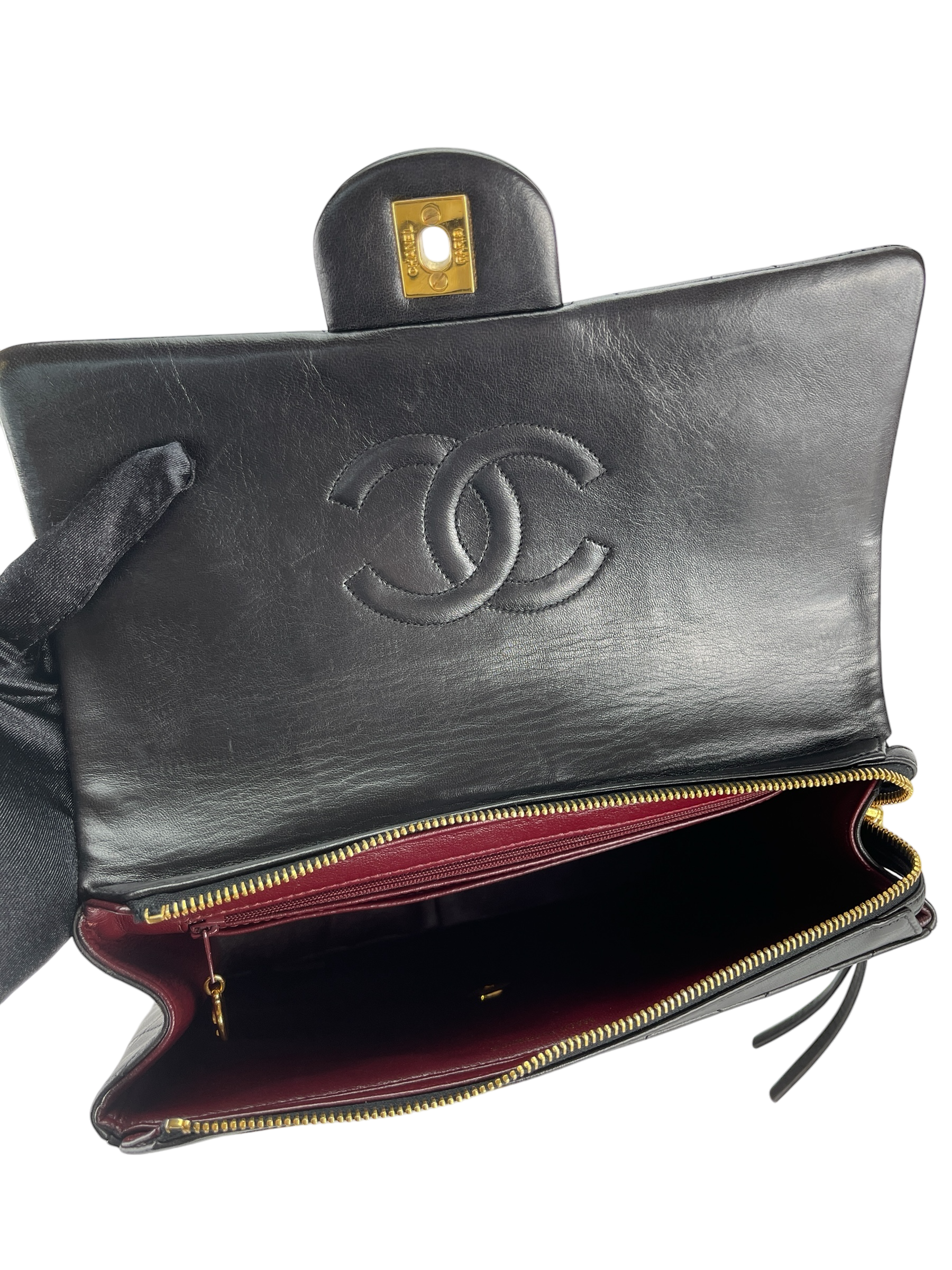 CHANEL - Black Lambskin Deca Coco Mark Matelasse Backpack