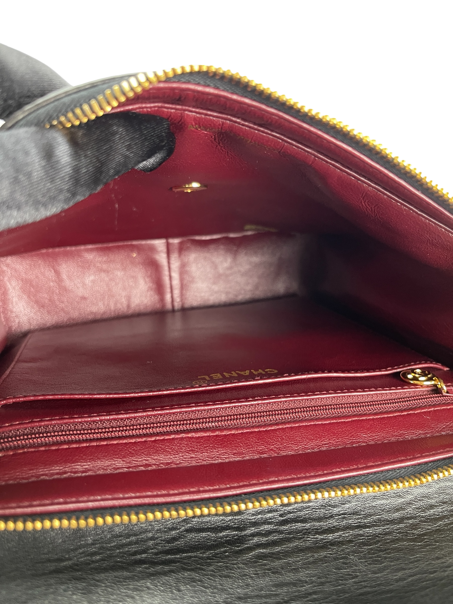 CHANEL - Black Lambskin Deca Coco Mark Matelasse Backpack