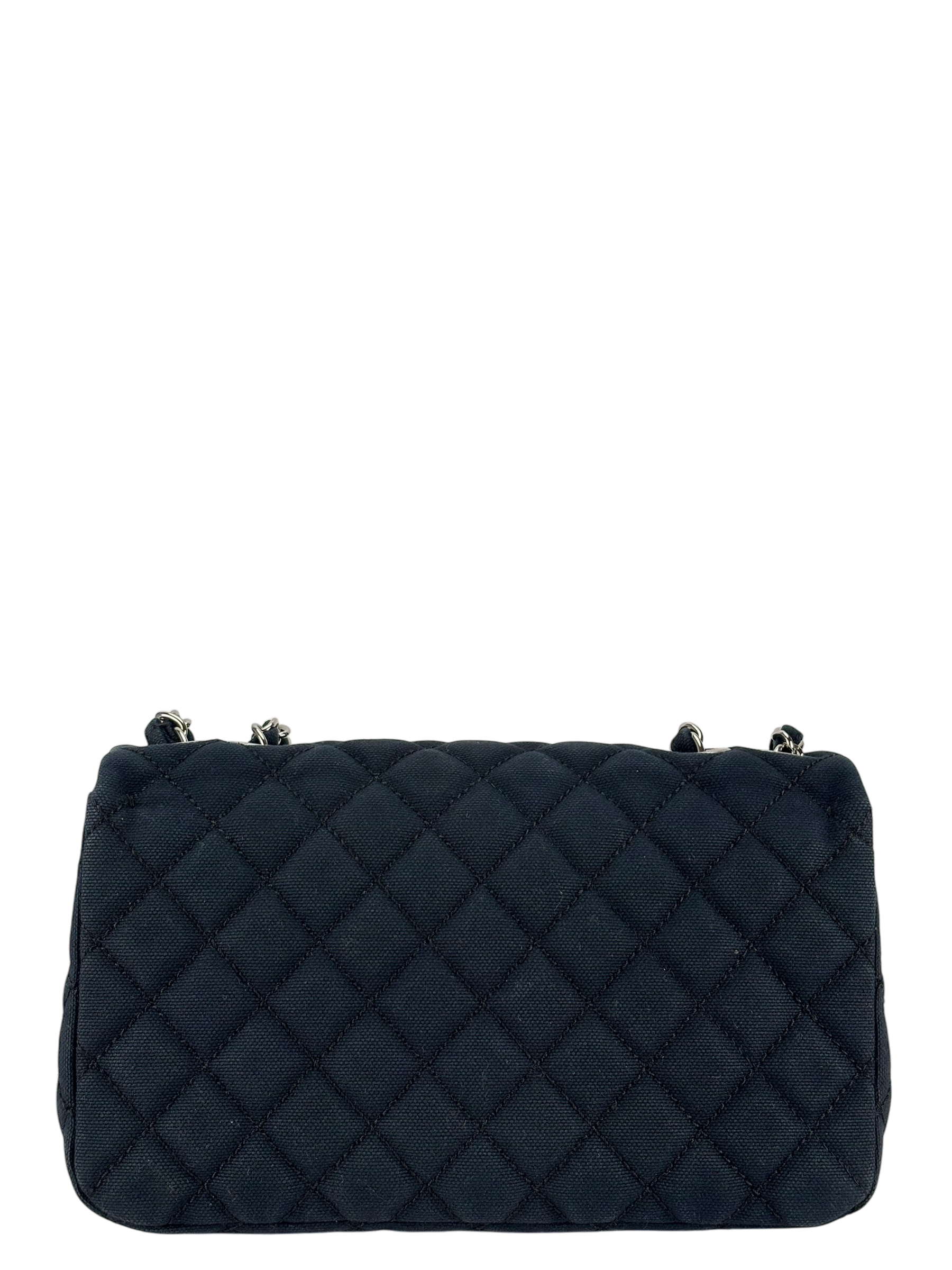 CHANEL - Navy Quilted Fabric CC Cruise Chain Flap Bag