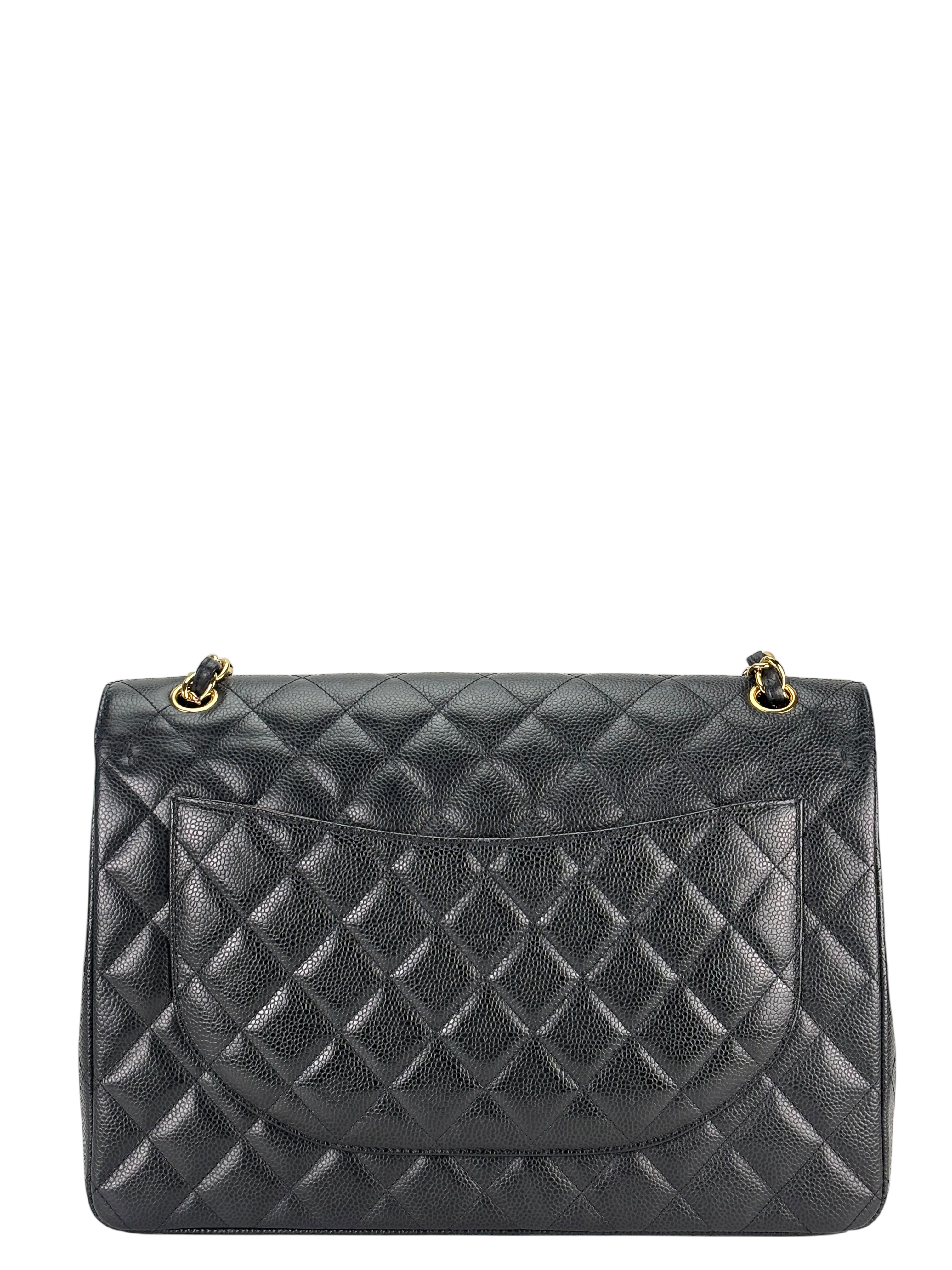 CHANEL - Black Caviar Jumbo Quilted Maxi Single Flap Bag