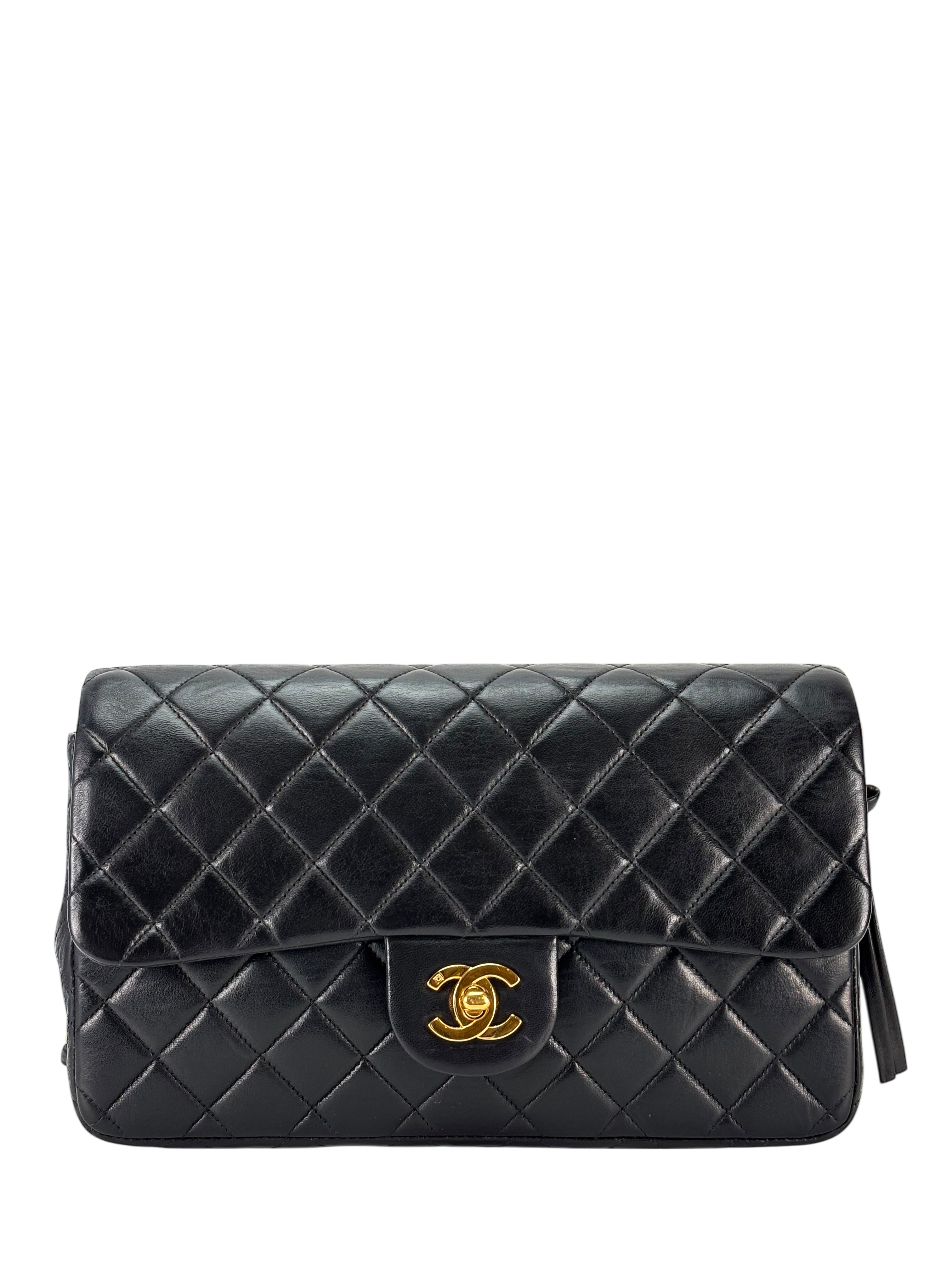 CHANEL - Black Lambskin Quilted Flap Backpack 