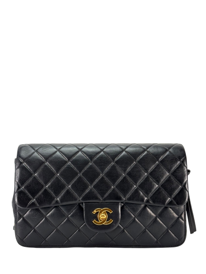 CHANEL - Black Lambskin Quilted Flap Backpack 