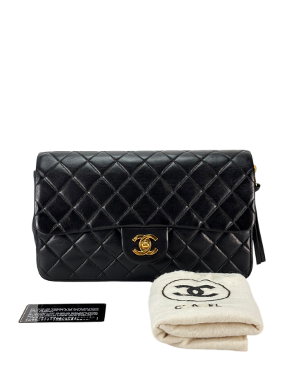 CHANEL - Black Lambskin Quilted Flap Backpack 