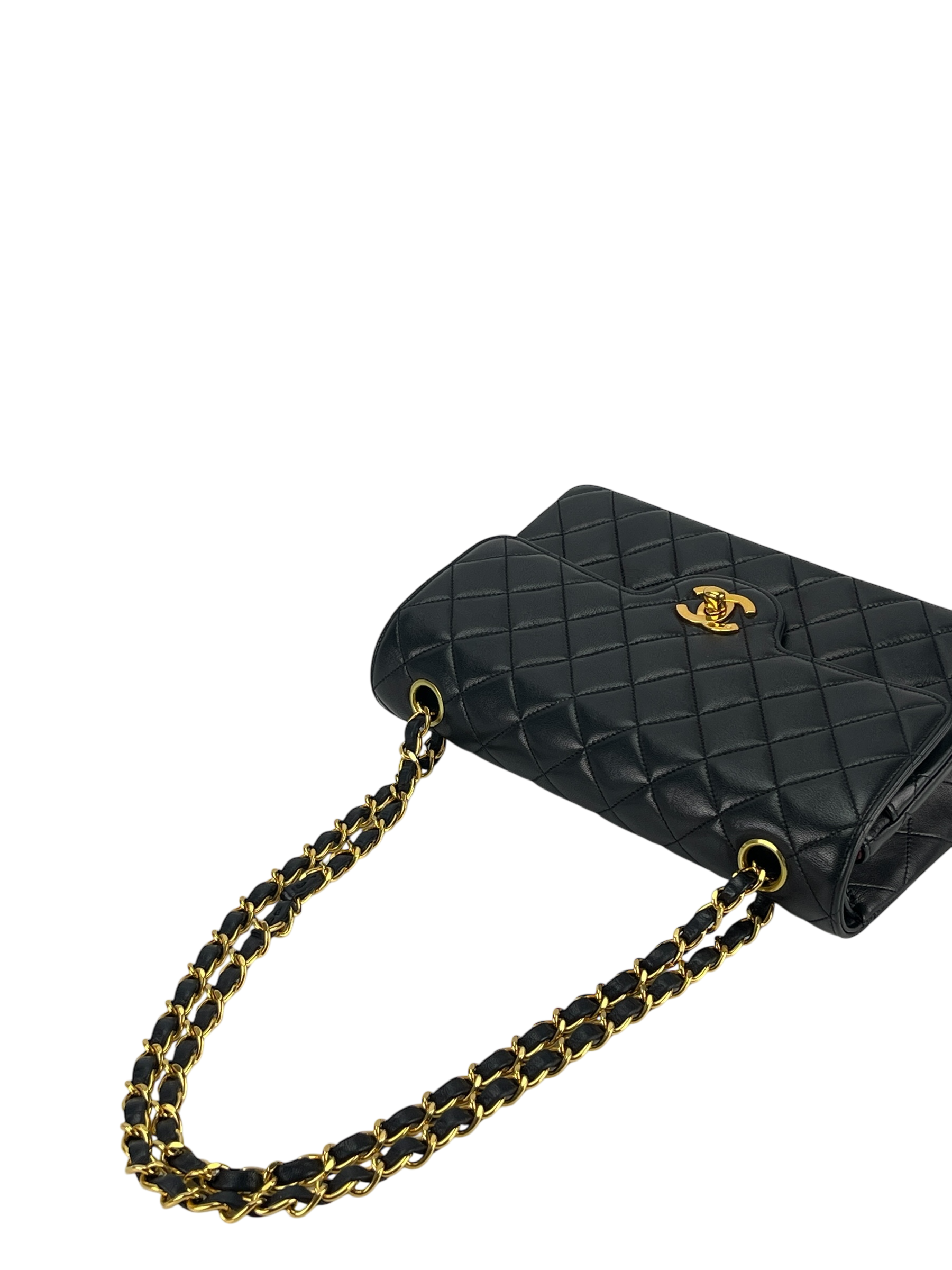 CHANEL - Black Quilted Lambskin Circle Turn Lock Half Flap Chain Shoulder Bag