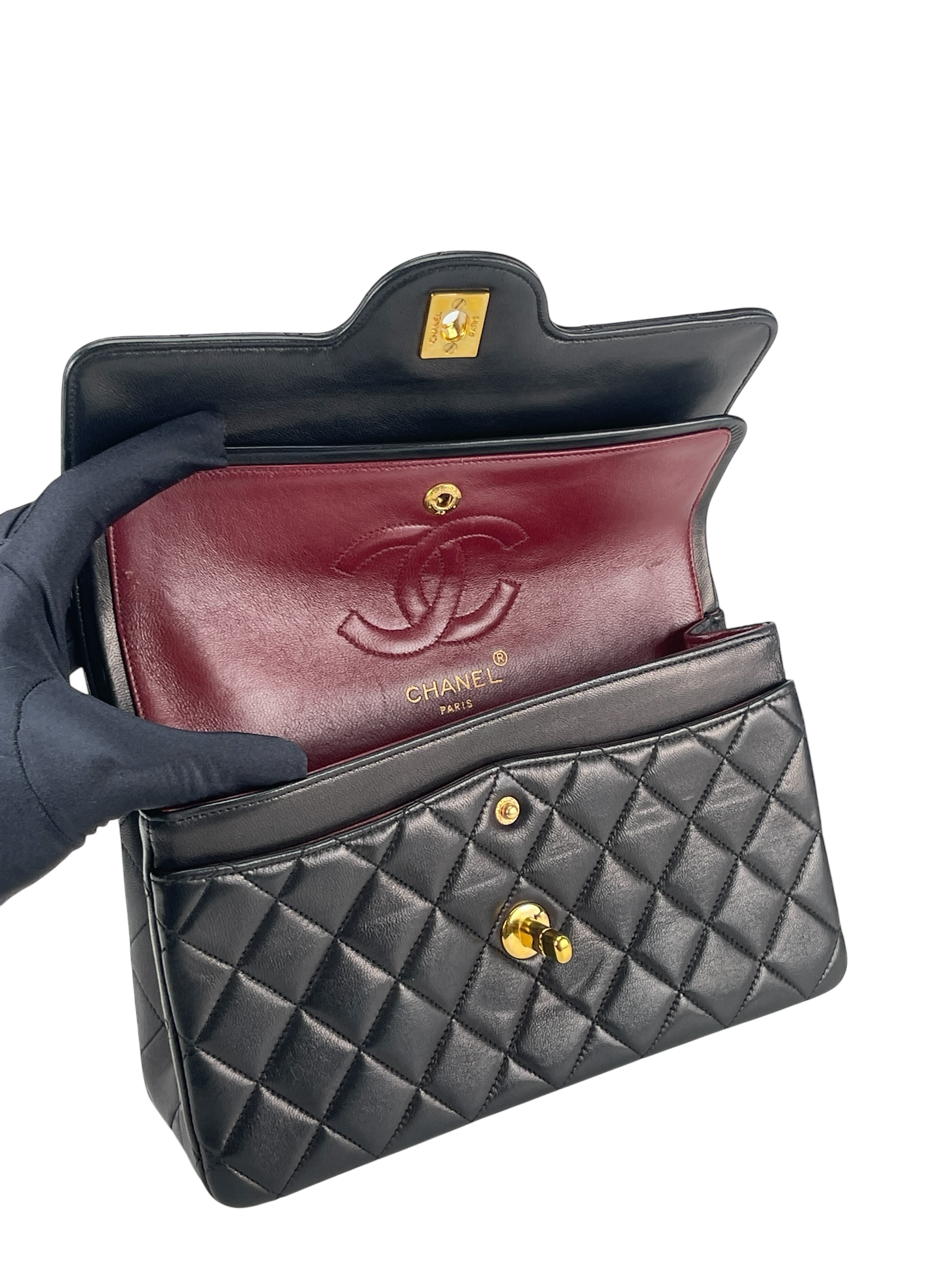 CHANEL - Black Quilted Lambskin Circle Turn Lock Half Flap Chain Shoulder Bag