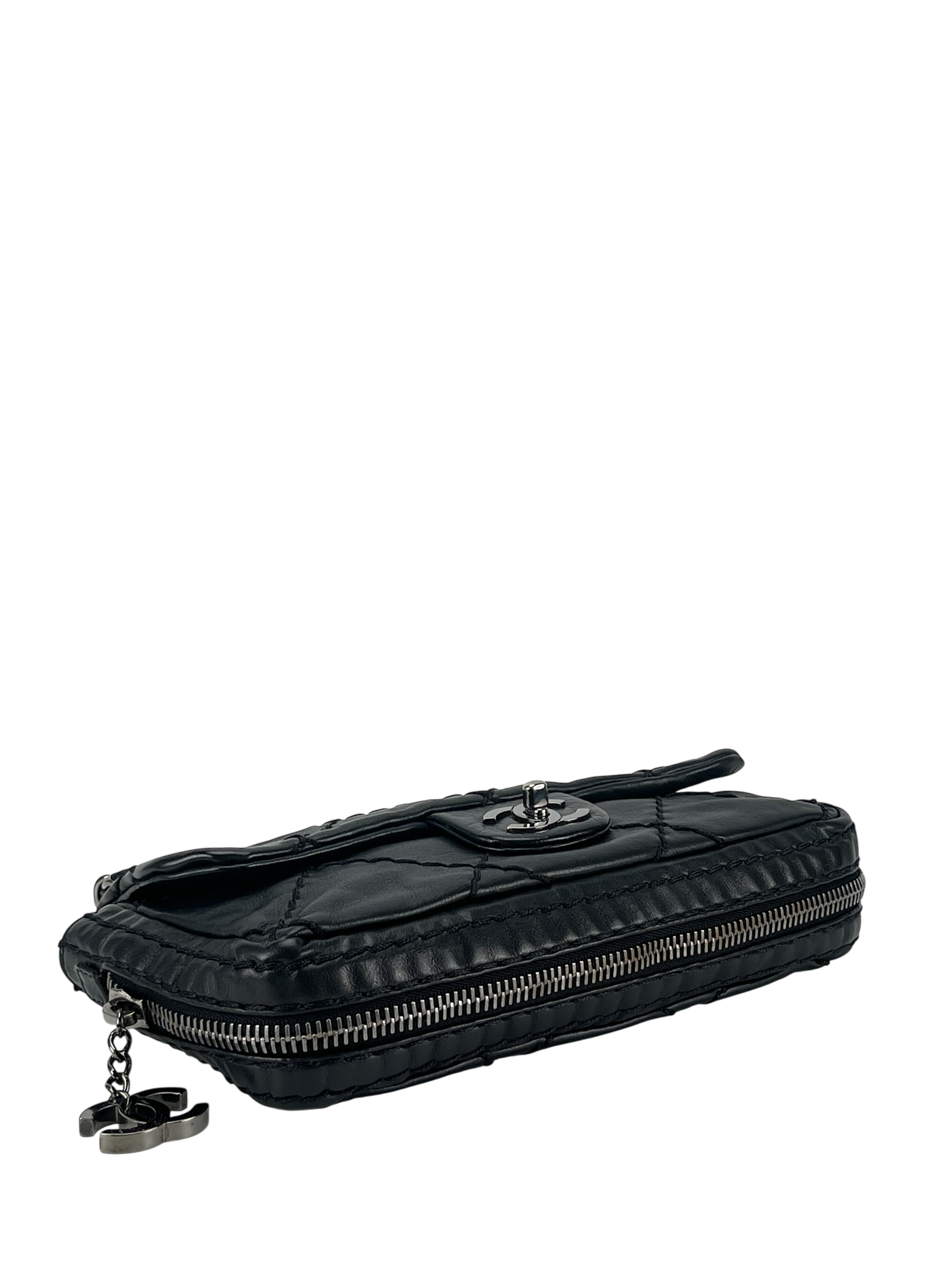CHANEL - Black Quilted Calfskin Expandable Flap Bag 