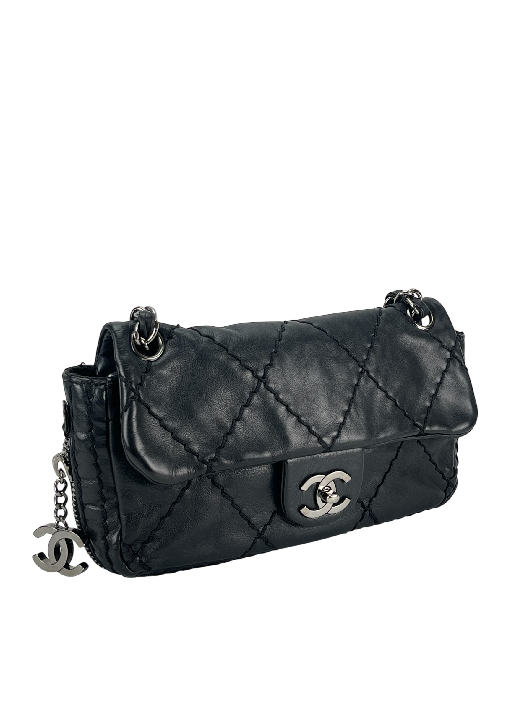 CHANEL - Black Quilted Calfskin Expandable Flap Bag 