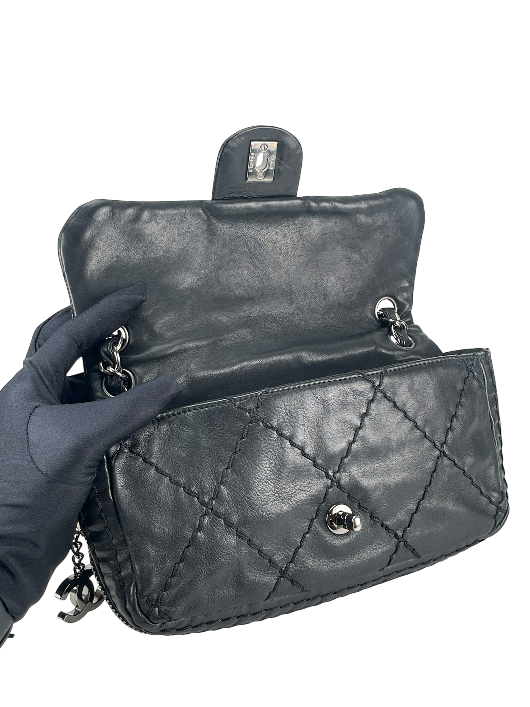 CHANEL - Black Quilted Calfskin Expandable Flap Bag 