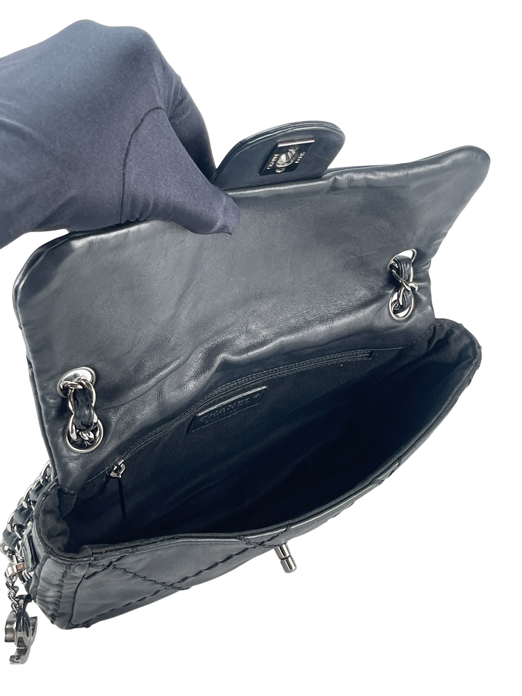 CHANEL - Black Quilted Calfskin Expandable Flap Bag 