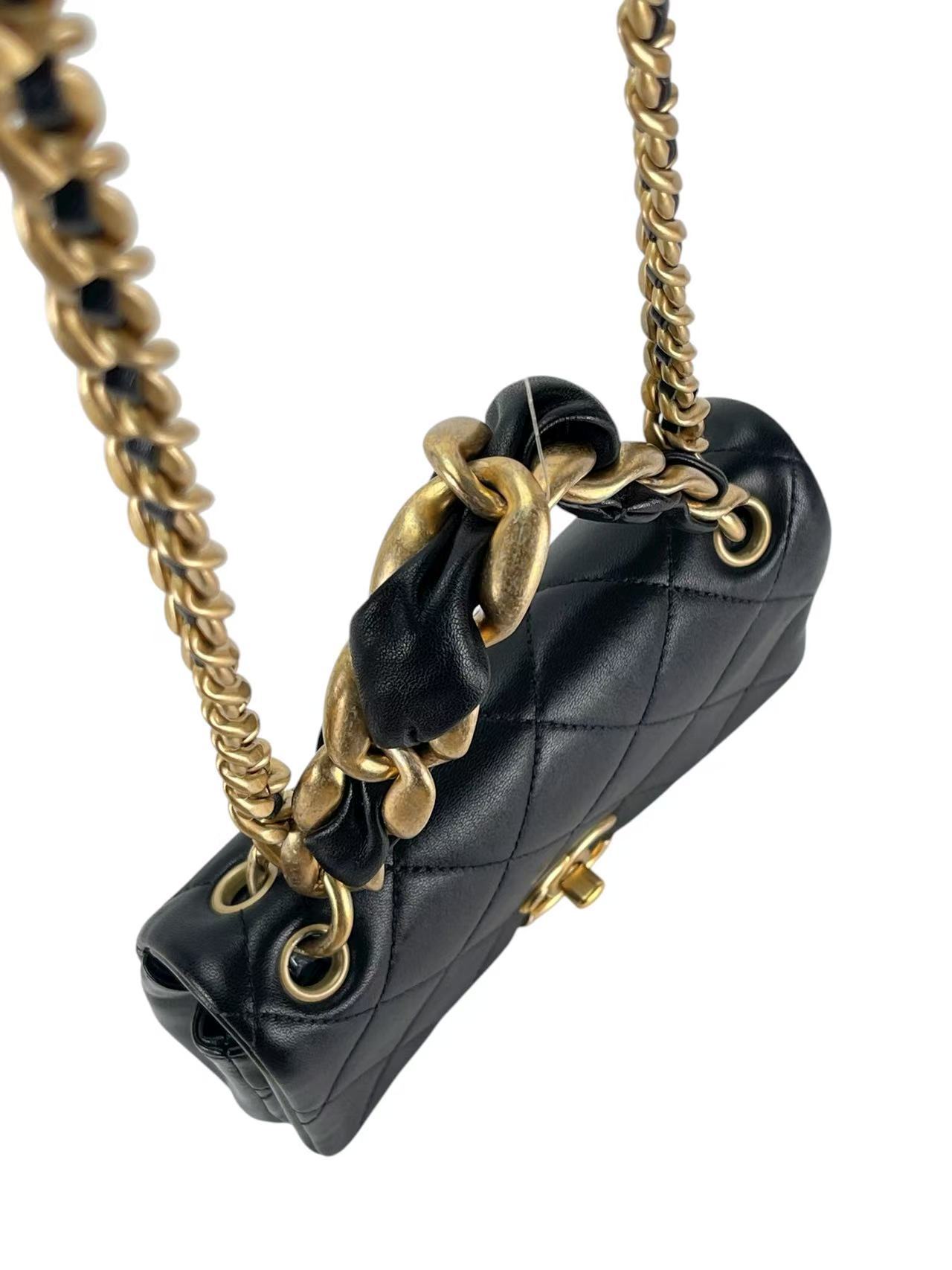 CHANEL - Black Calfskin Flap Bag with Top Handle