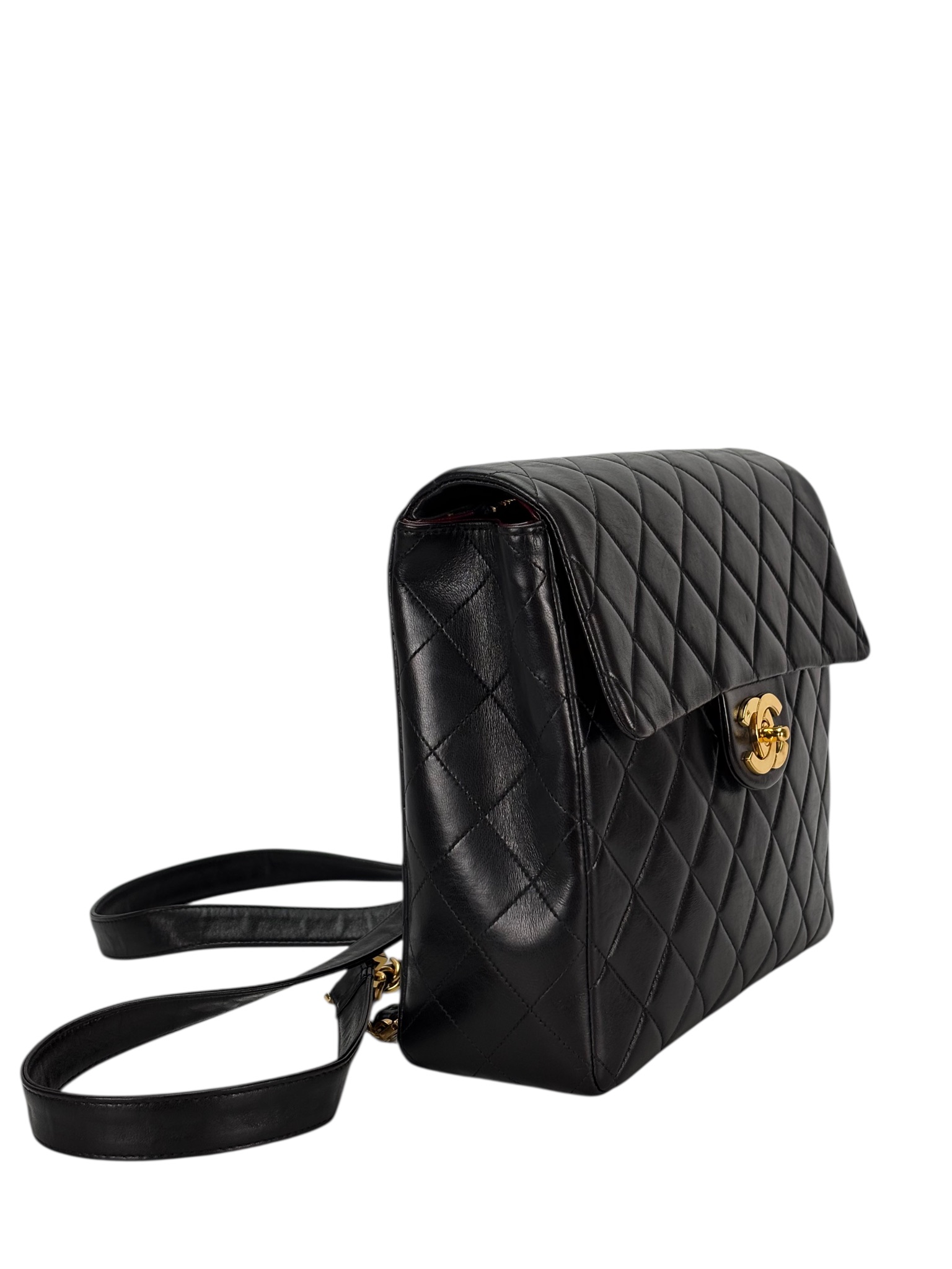 CHANEL - Black Lambskin Deca Coco Mark Matelasse Backpack