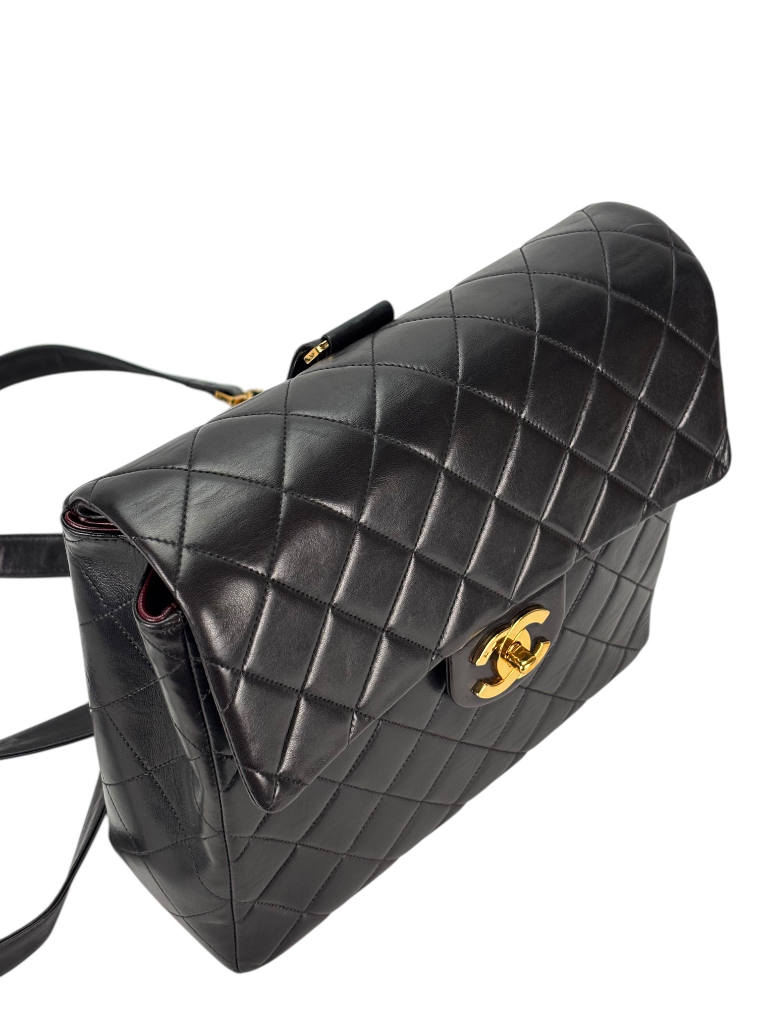CHANEL - Black Lambskin Deca Coco Mark Matelasse Backpack