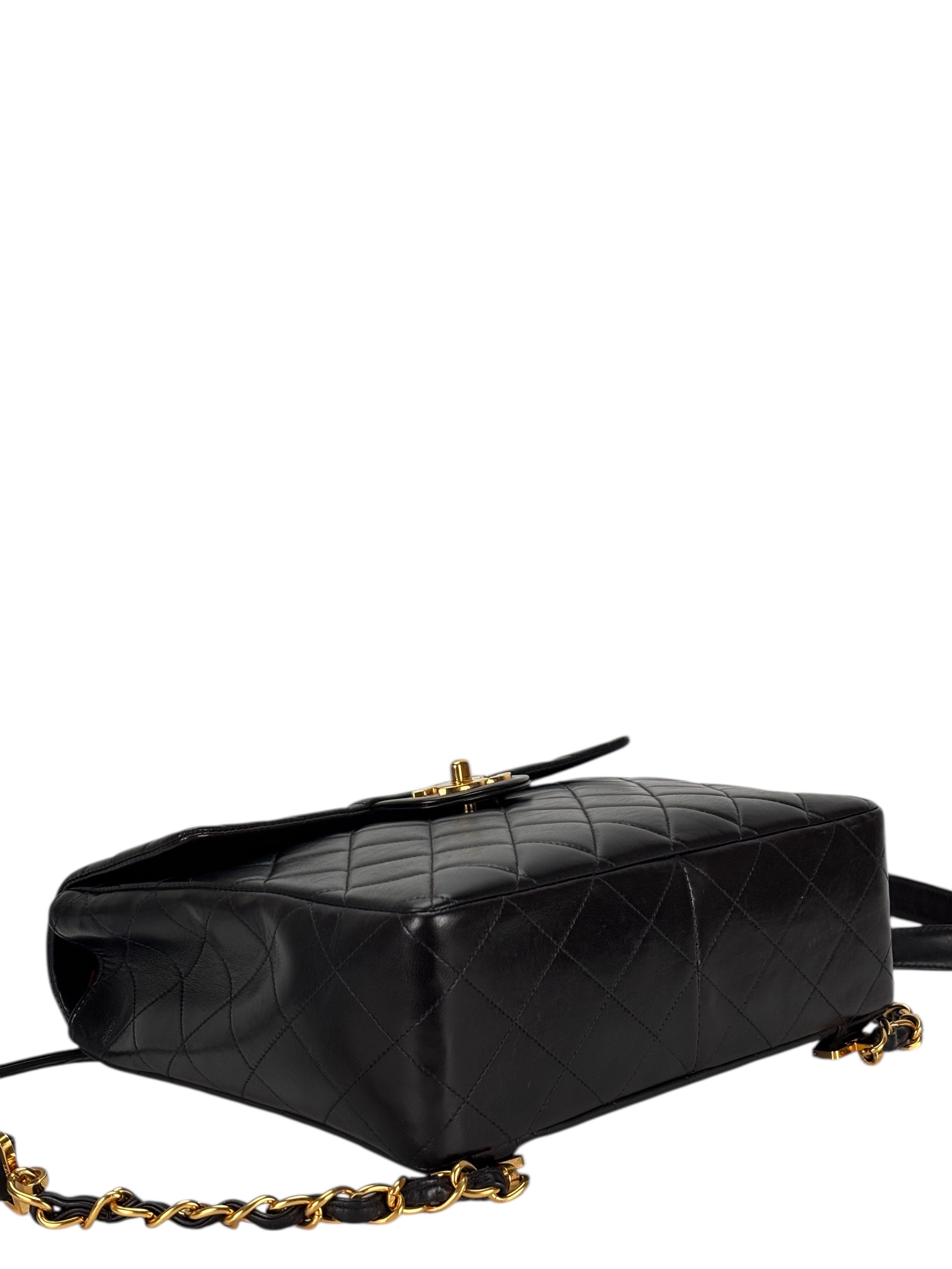 CHANEL - Black Lambskin Deca Coco Mark Matelasse Backpack